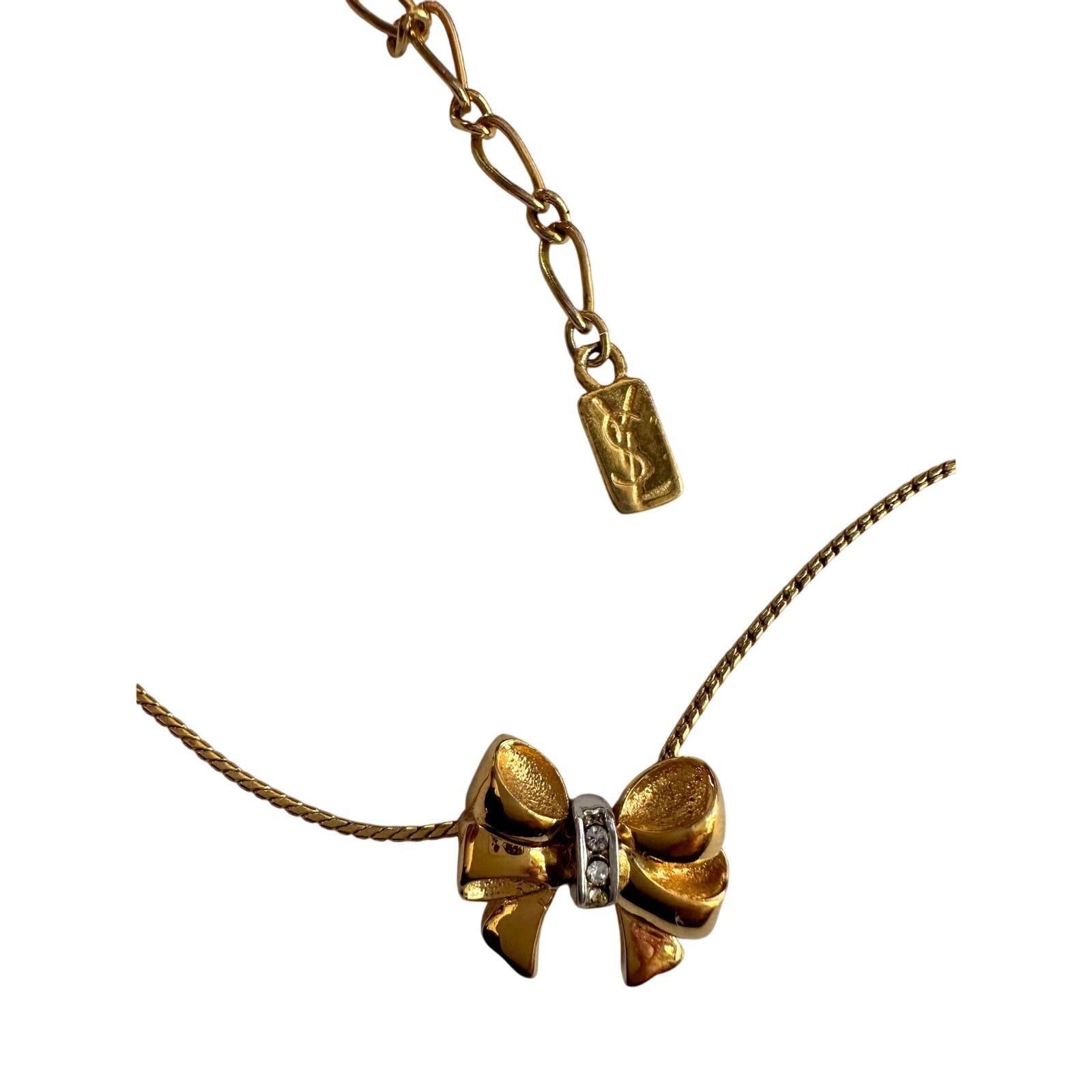 Yves Saint Laurent Yves Saint Laurent Gold and Rhinestone Bow Necklace Size ONE SIZE - 12 Thumbnail