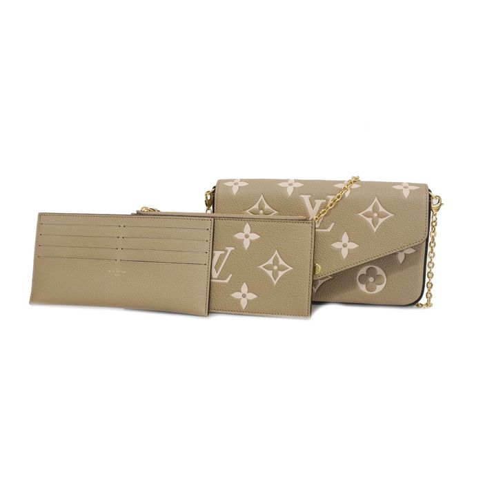 Louis Vuitton 8 Credit Card Insert Beige Empreinte Leather Wallet from Felicie