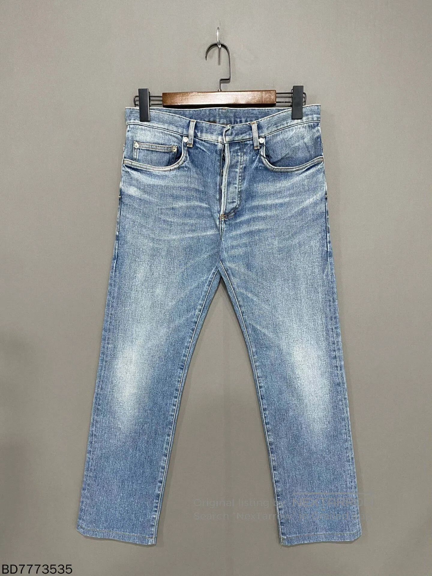 blue wash denim pants by Dior.