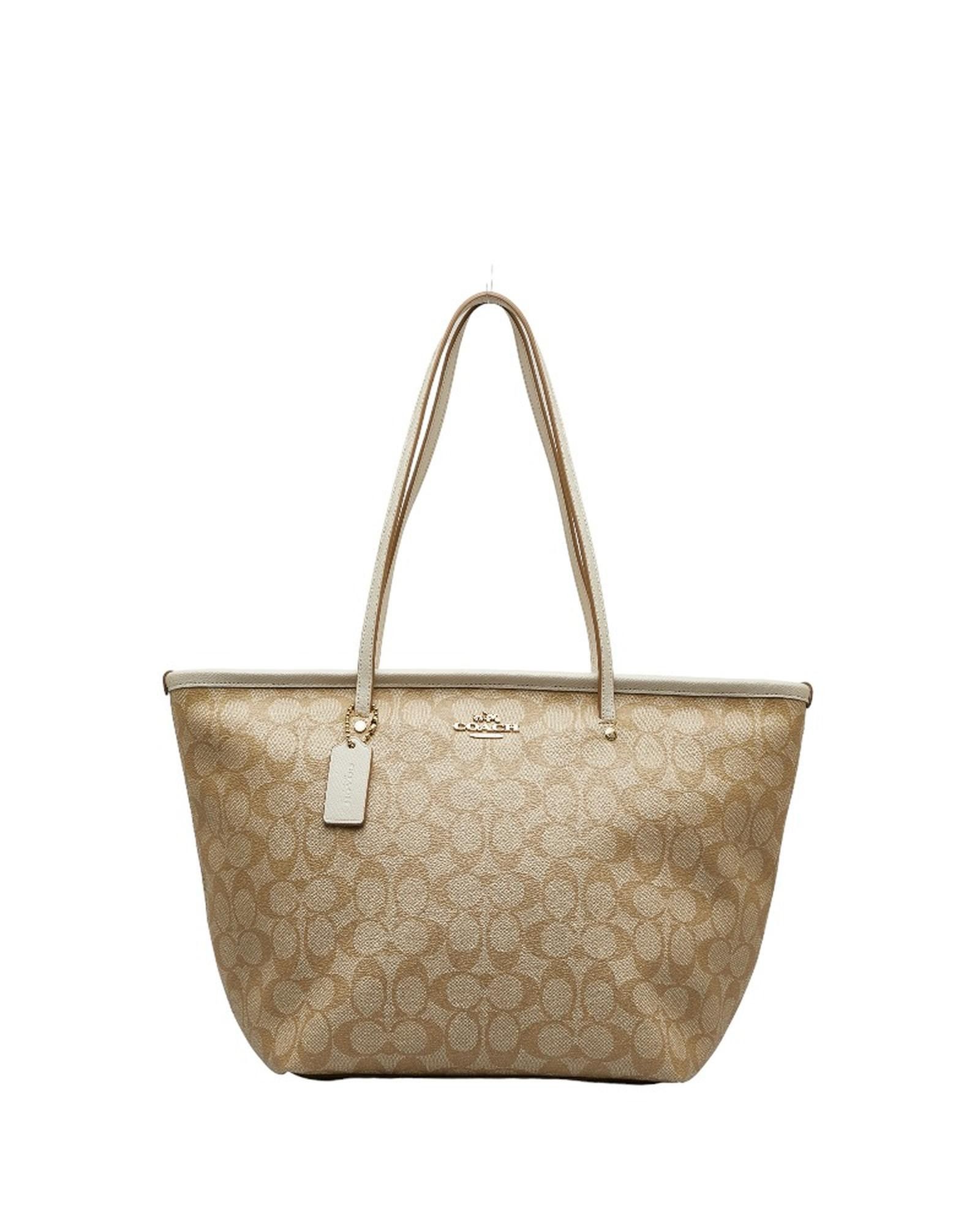 image of Coach Signature Canvas Street Zip Tote Bag in Brown, Women's