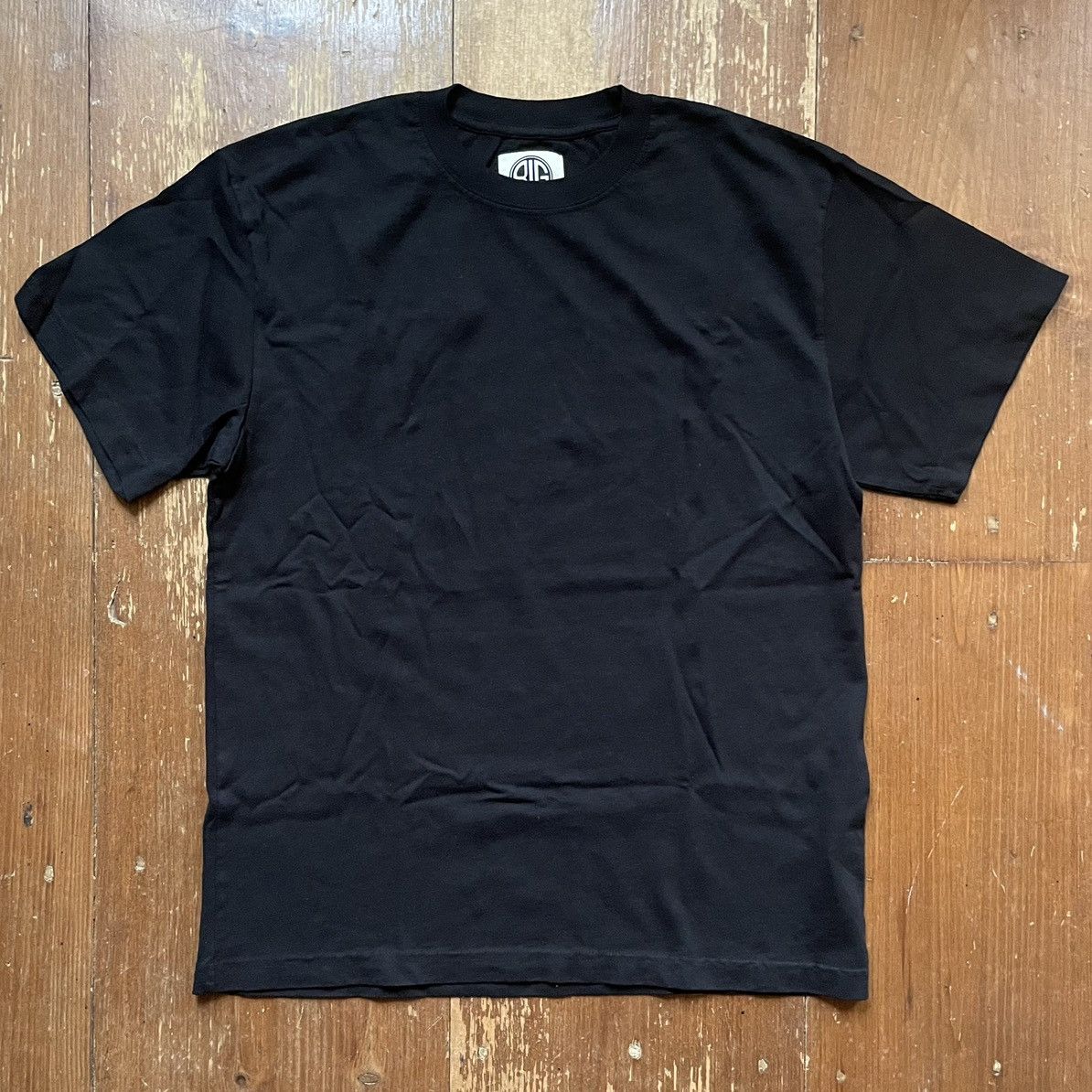 Blue in green BRAND NEW basic black heavyweight T shirt.