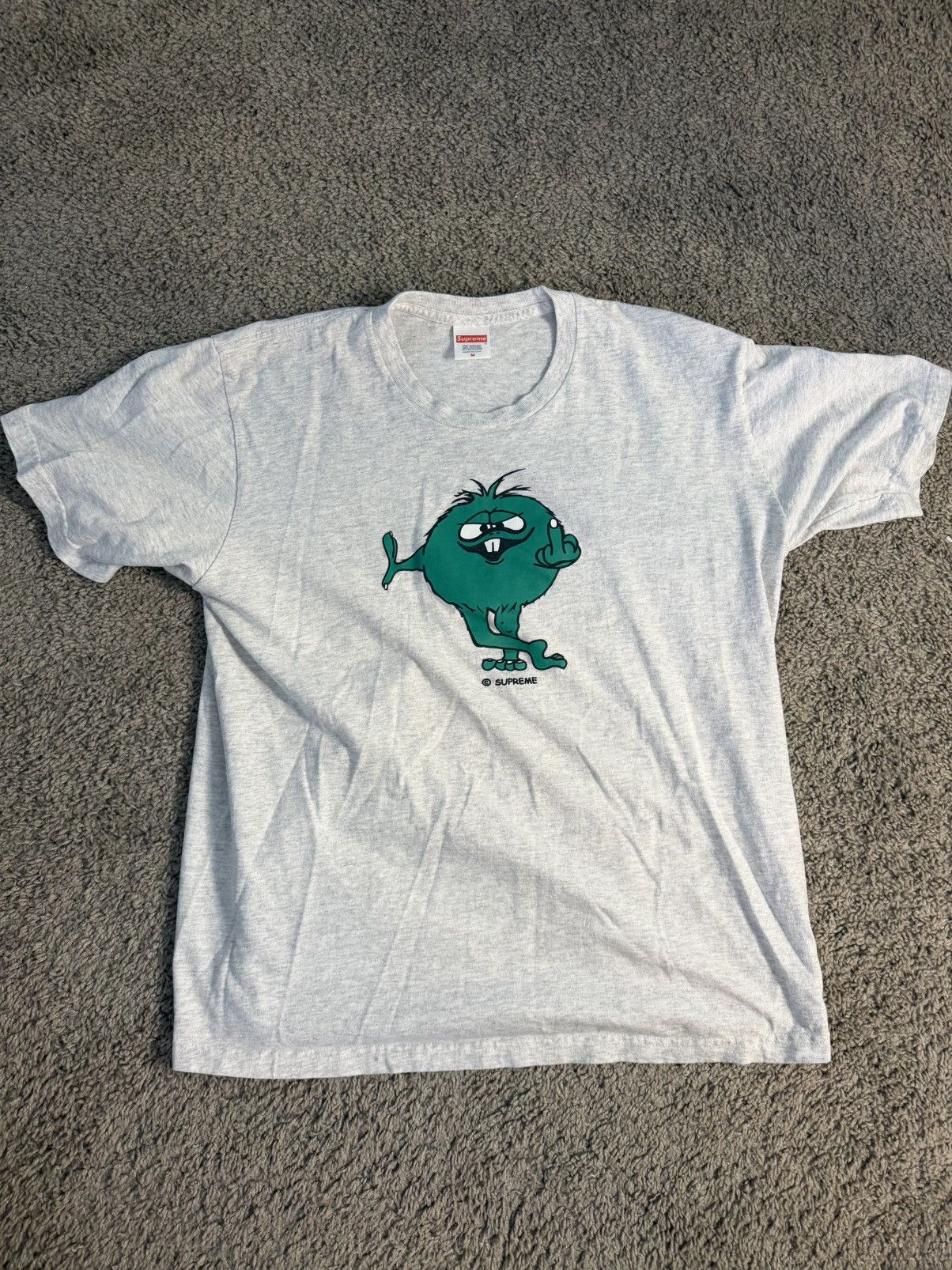 Supreme Supreme Someone Talked Tee | Grailed