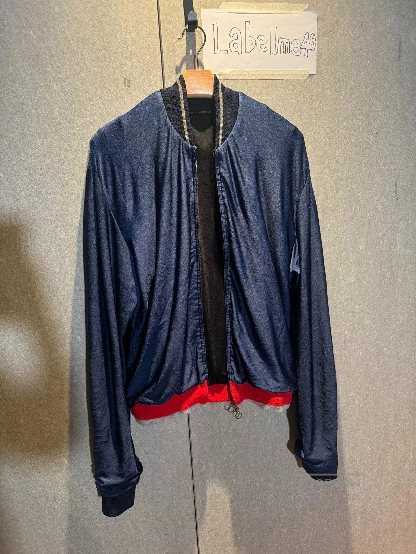 stylish navy and red bomber jacket.