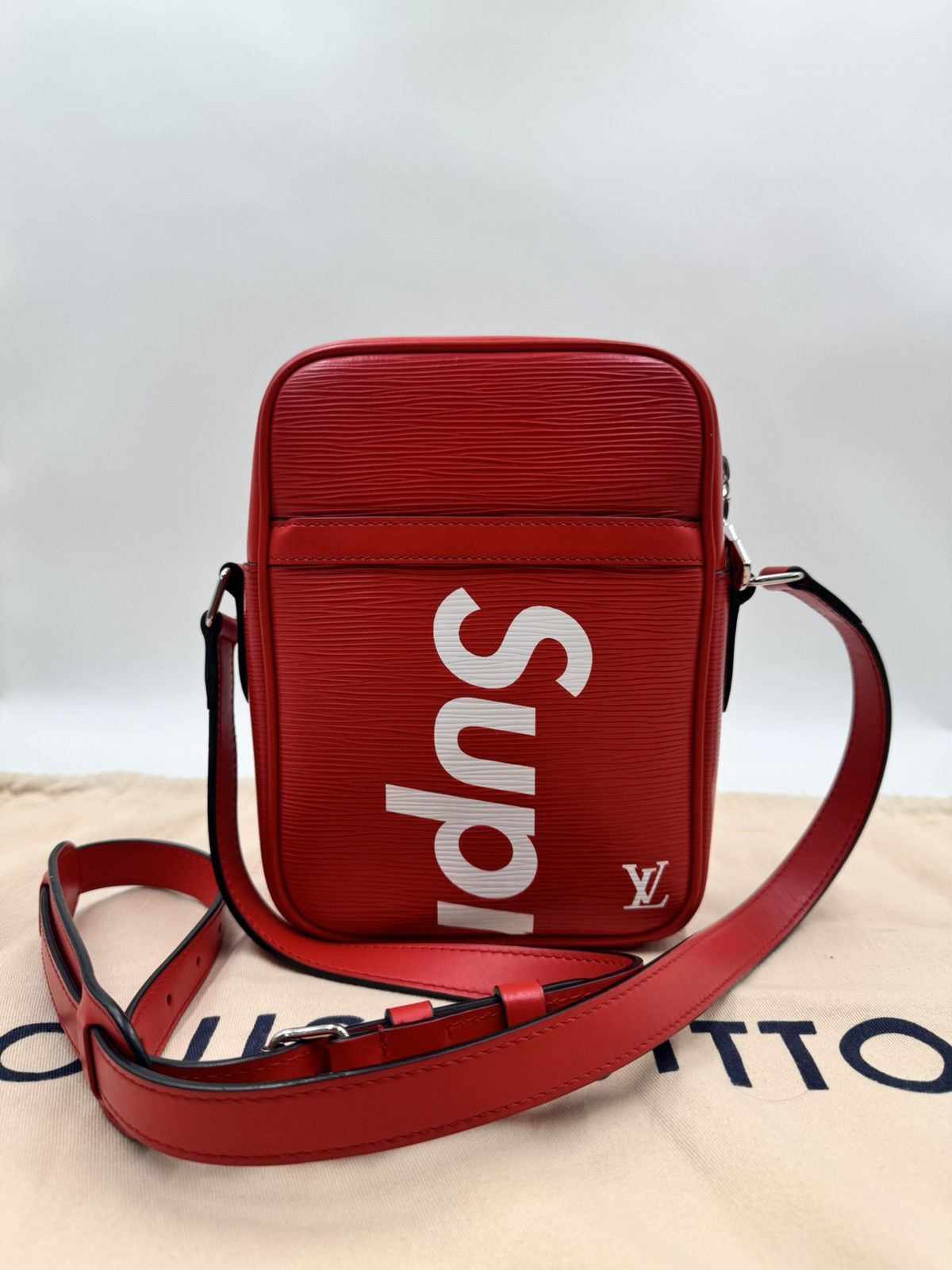 Louis Vuitton × Supreme Louis Vuitton X Supreme Epi Danube Pm Red Sling Bag Size 30 - 1 Thumbnail