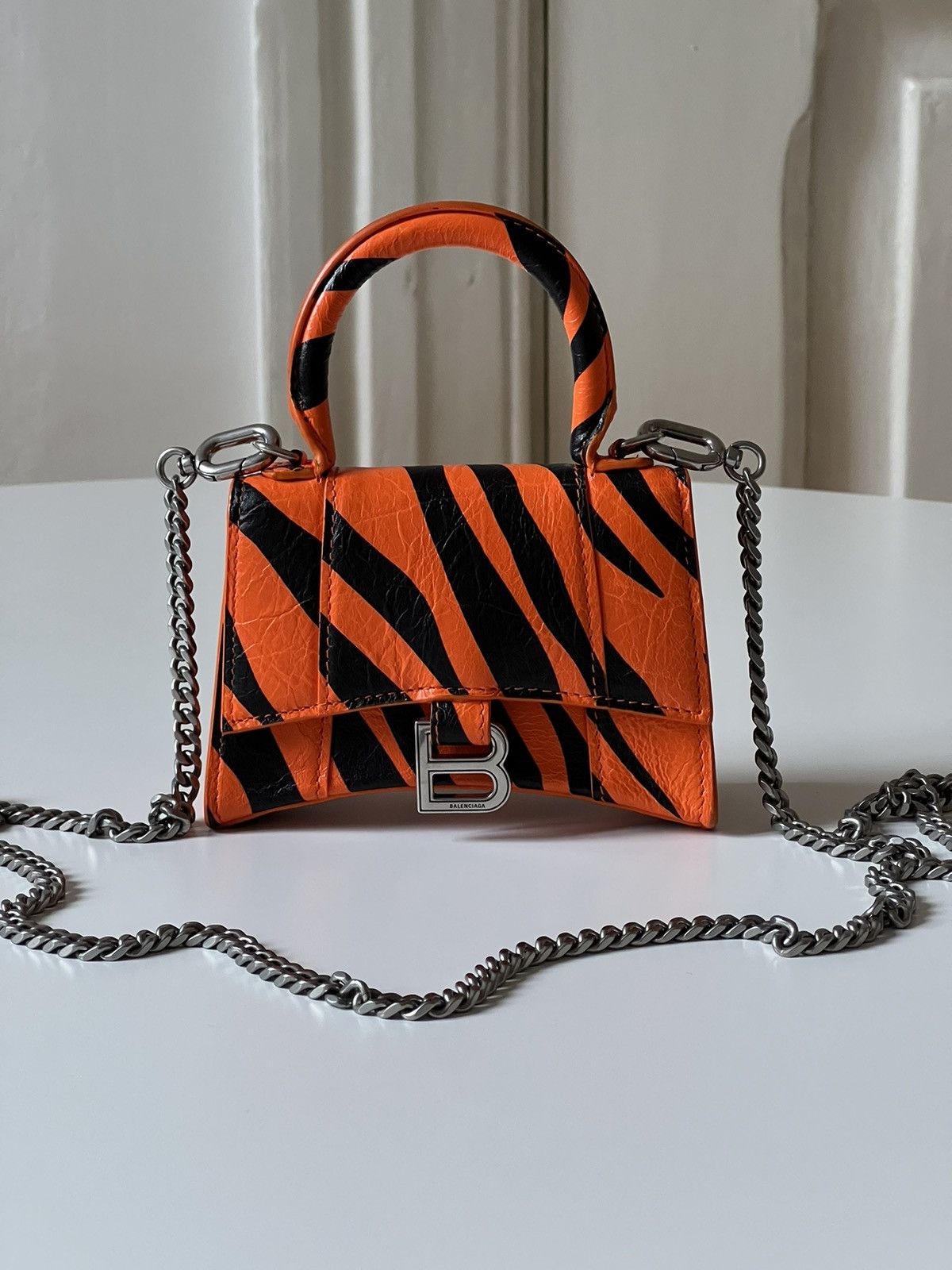 image of Balenciaga Hourglass Tiger Mini Bag in Orange, Men's