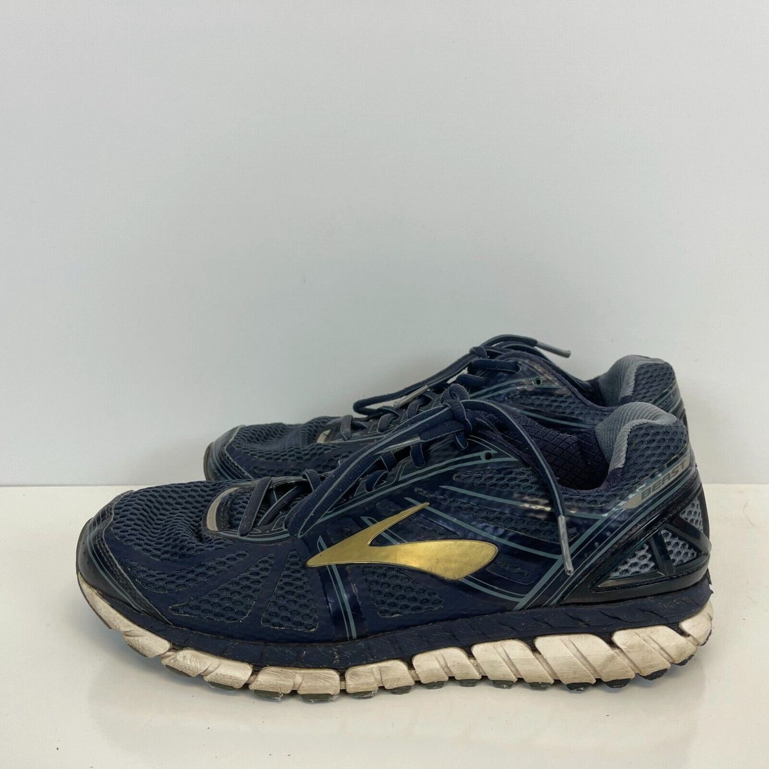 image of Brooks Beast 16 Road Running Shoes Blue Gold Womens Size 9.5 2E in White