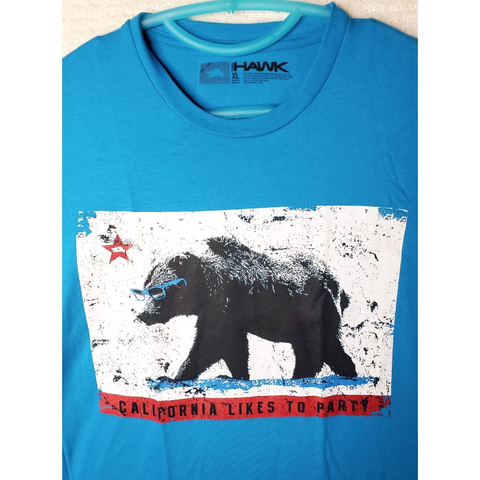 Vintage Tony Hawk T-Shirt Mens XL Blue Short Sleeve Crew Neck California Likes To Party Bear Logo Saying Graphic Print Jersey Solid Size US XL / EU 56 / 4 - 3 Thumbnail