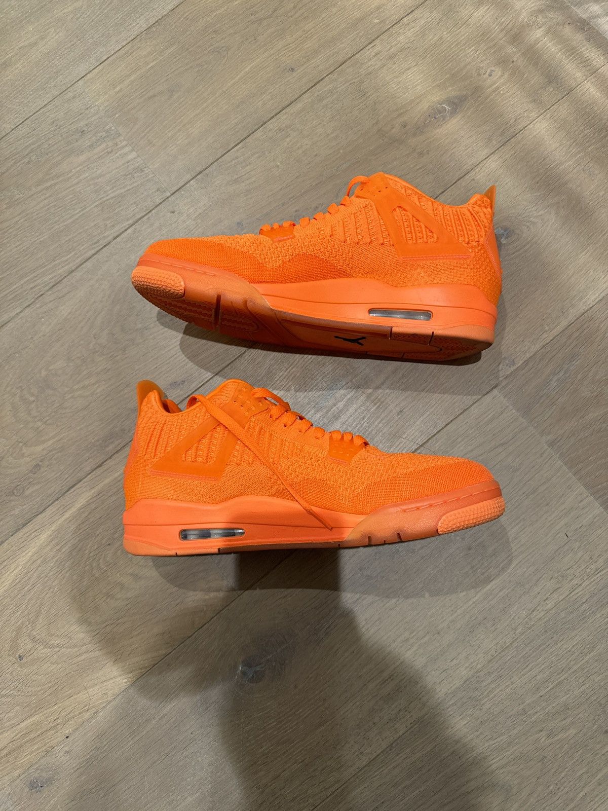 Air jordan 4 flyknit orange hot sale