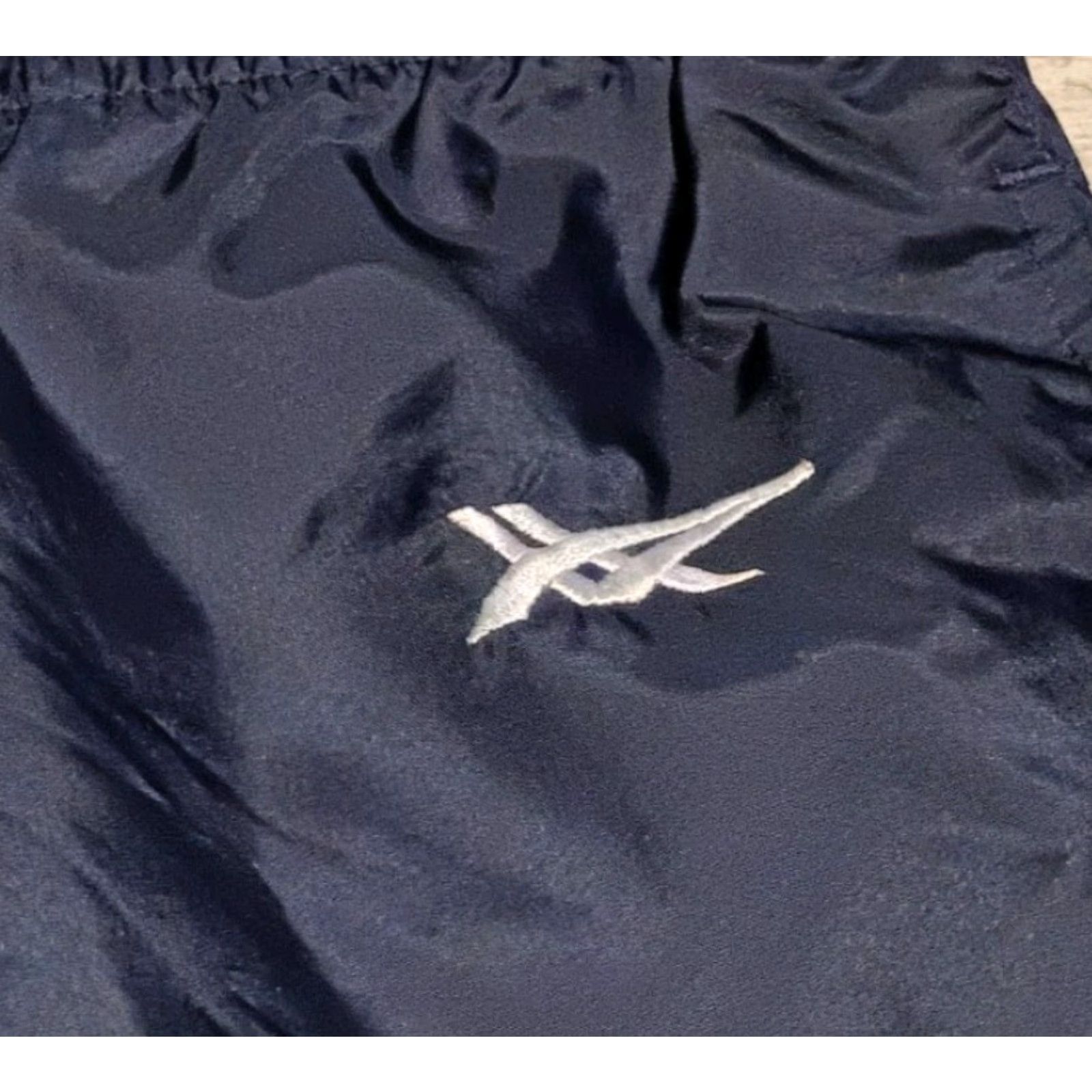 Asics VINTAGE ASICS Track Pants Windbreaker Navy 80s 90s Packable Zip Leg S Mens Size US 29 - 4 Thumbnail