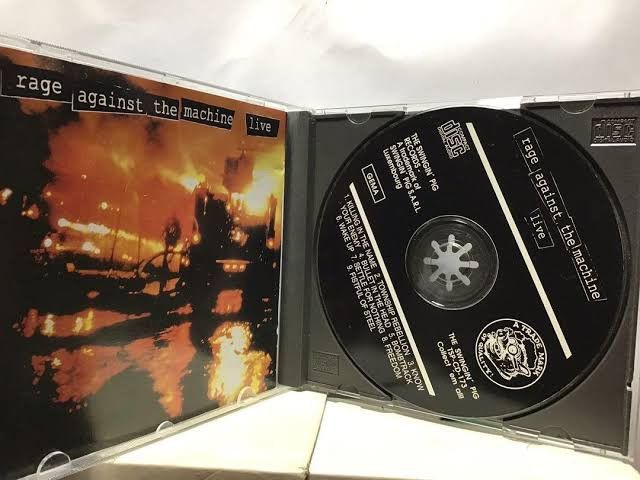 Japanese Brand × thisisneverthat Thisisneverthat rage against the machine swingin pig cover Size US S / EU 44-46 / 1 - 3 Thumbnail