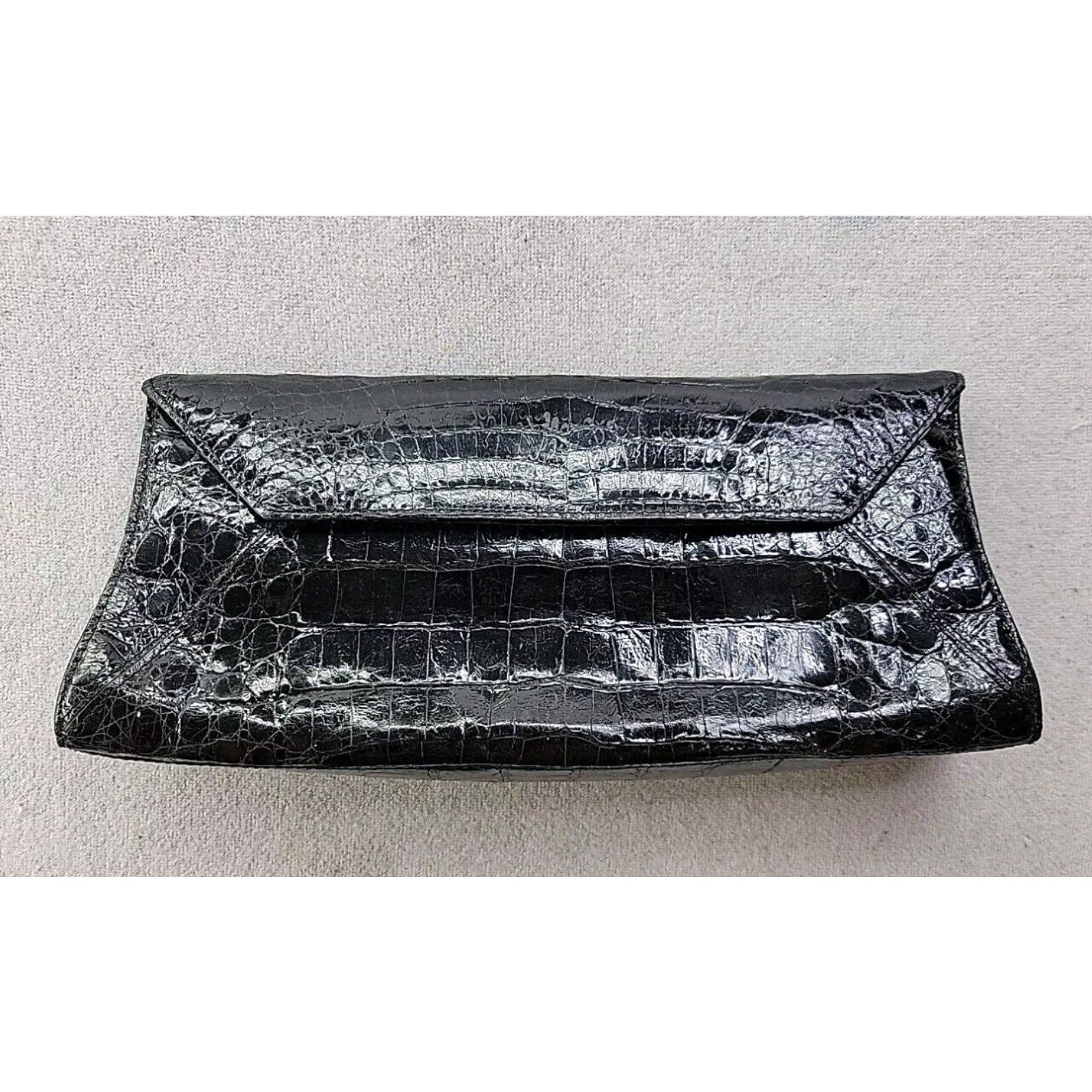 image of Vintage Nancy Gonzalez Black Crocodile Clutch Strong Magnetic Structured - Paint Stained in White, 