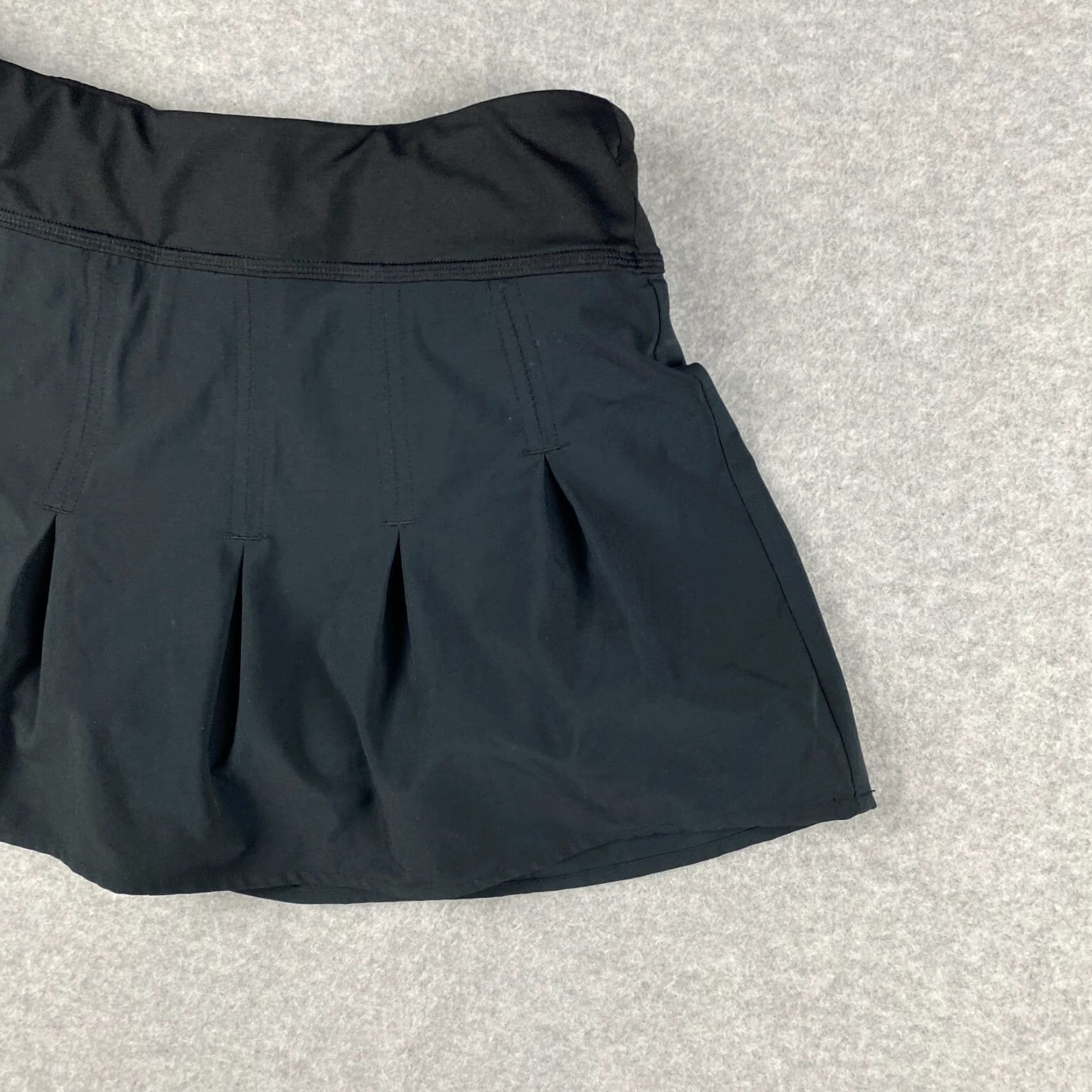 Athleta Athleta Skort Womens XS Black Pleated Zip Pocket Stretch Active Tennis Size ONE SIZE - 2 Thumbnail