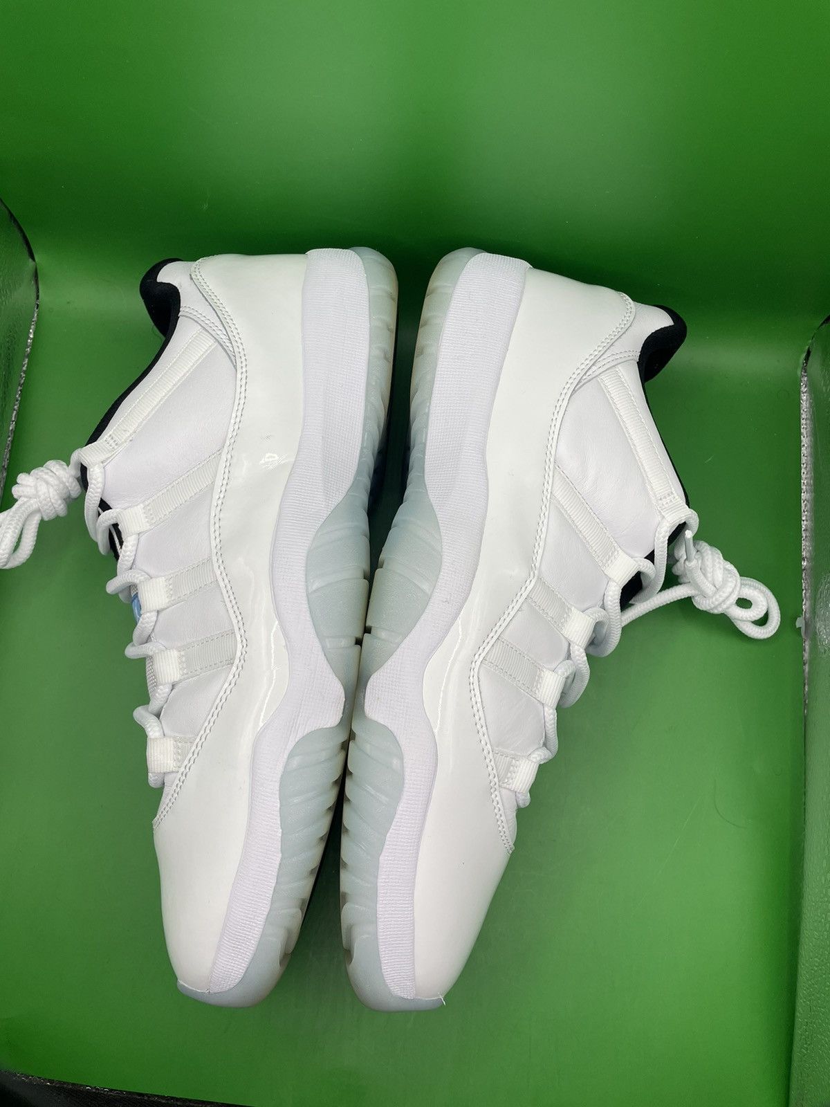image of Jordan Brand 11 Low Legend Blue Shoes in White, Men's