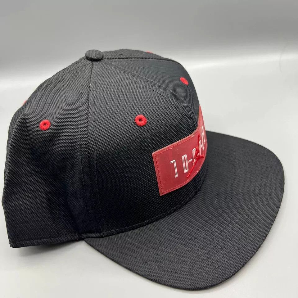 Jordan Brand Air Jordan 11 Hat Men Black Red Jumpman Bred Snap Back Cap Size ONE SIZE - 3 Thumbnail