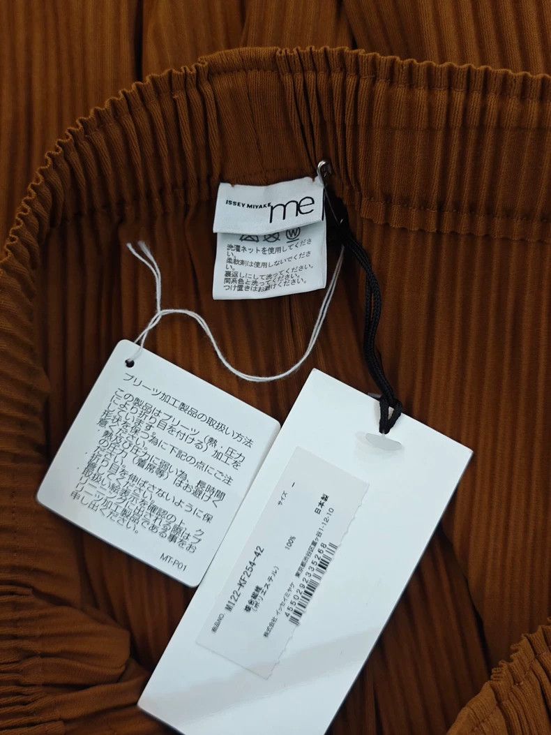 Issey Miyake Issey Miyake size:one size Orange pleated wide-leg pants Size 23" - 6 Thumbnail