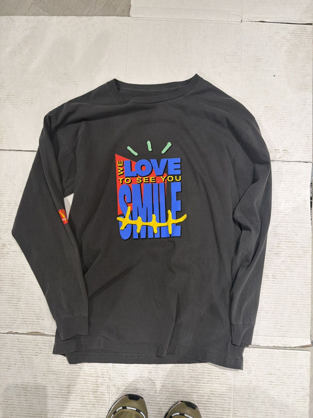 Travis McDonald’s we love to see you smile l/s