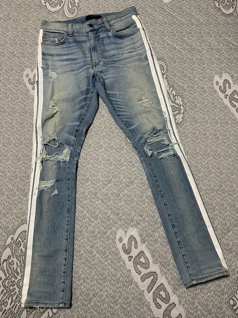 Amiri Tape Hole Water Washed Denim Pants