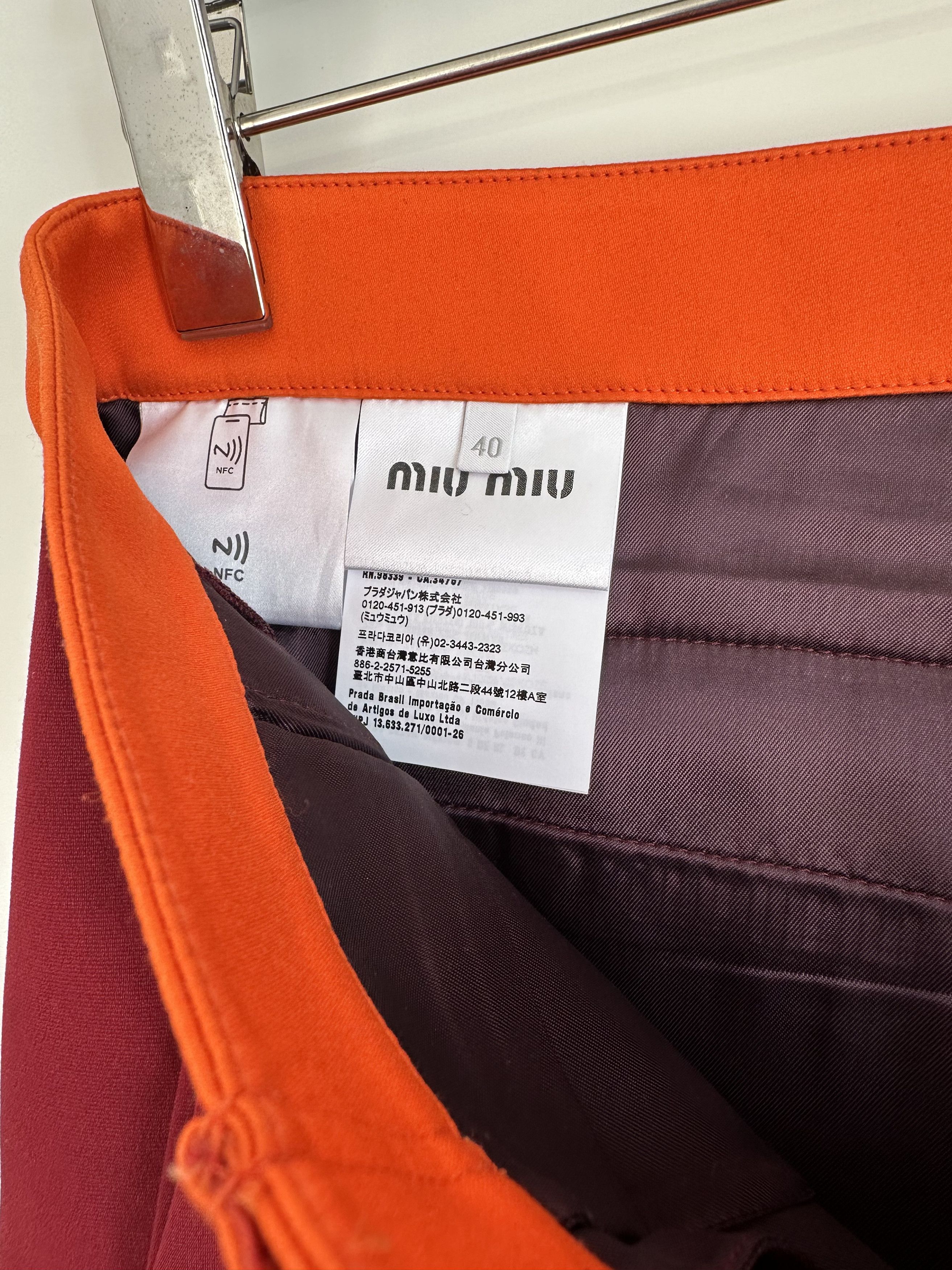 Miu Miu From the SS24 runway contrasting-waistband shorts $ 1,820 Size 30" / US 8 / IT 44 - 10 Thumbnail