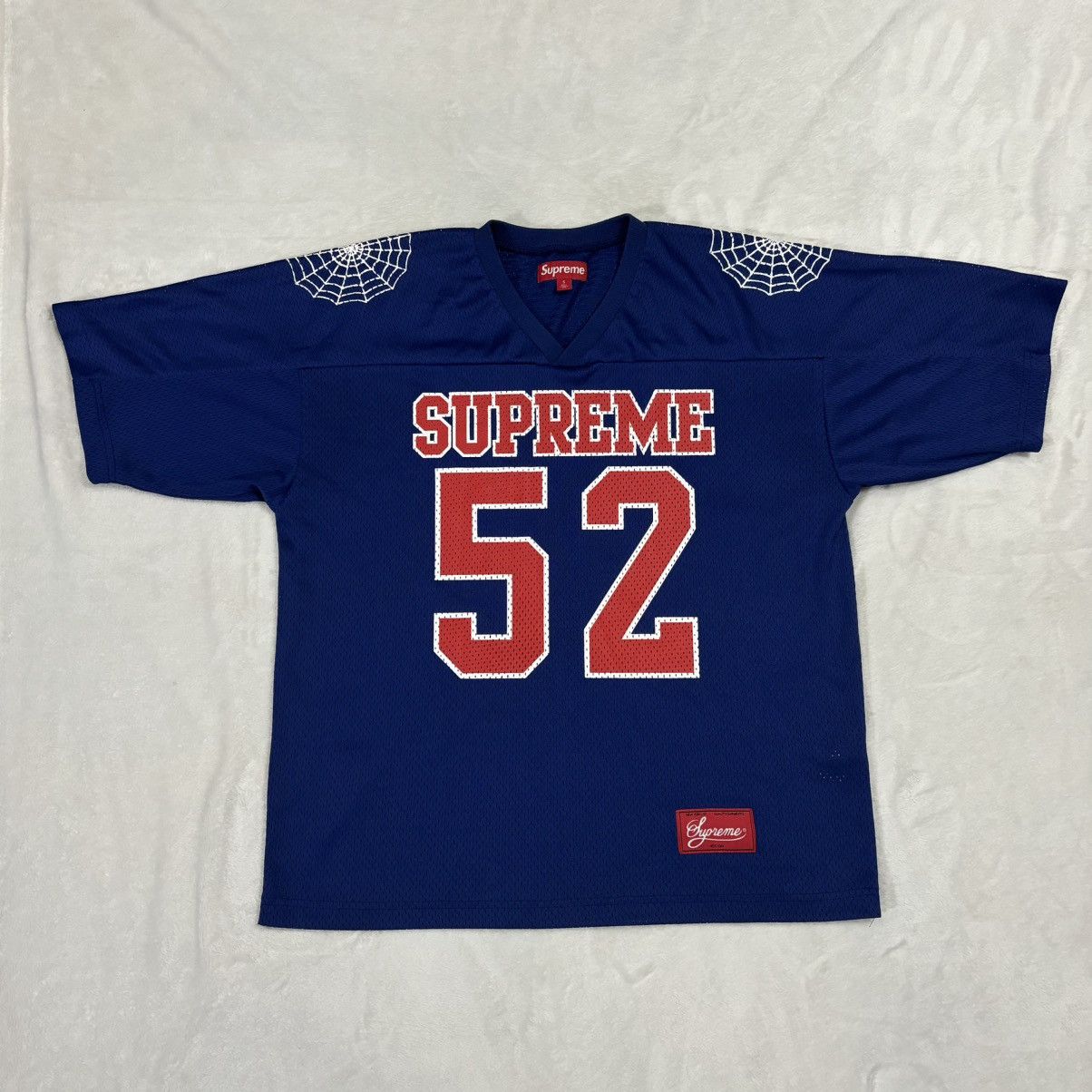 Supreme Supreme Spiderweb Football Jersey Navy - (M) SS24 | Grailed