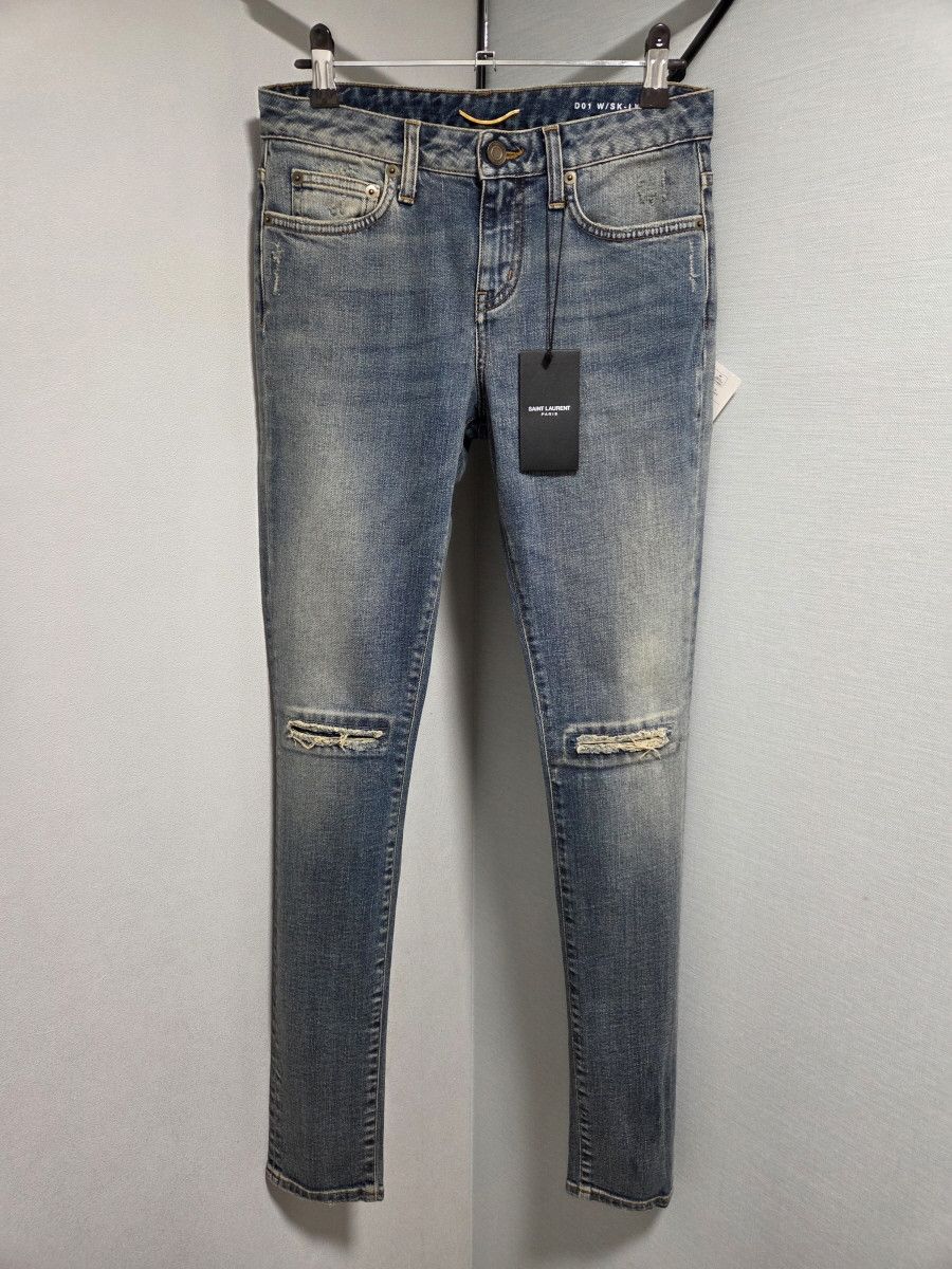 Saint Laurent Knee Distressed denim
