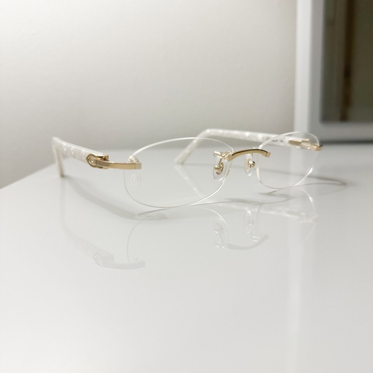 Pre-owned Cartier C Decor Rimless Gold/pearl Glasses