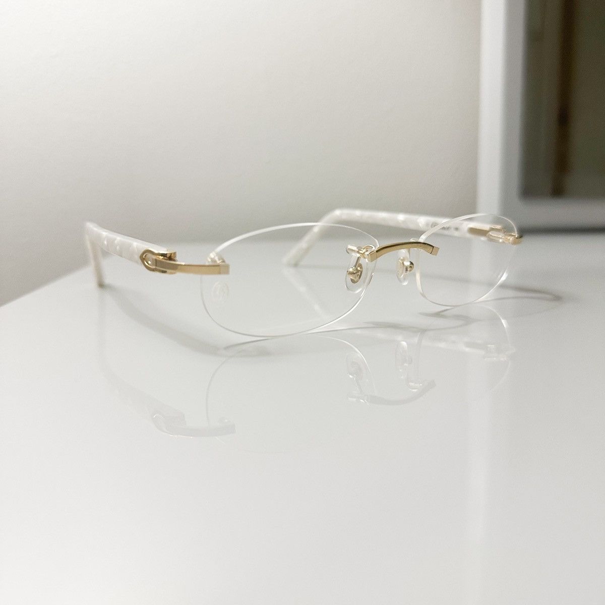 image of Cartier C Decor Rimless Gold/pearl Glasses, Men's
