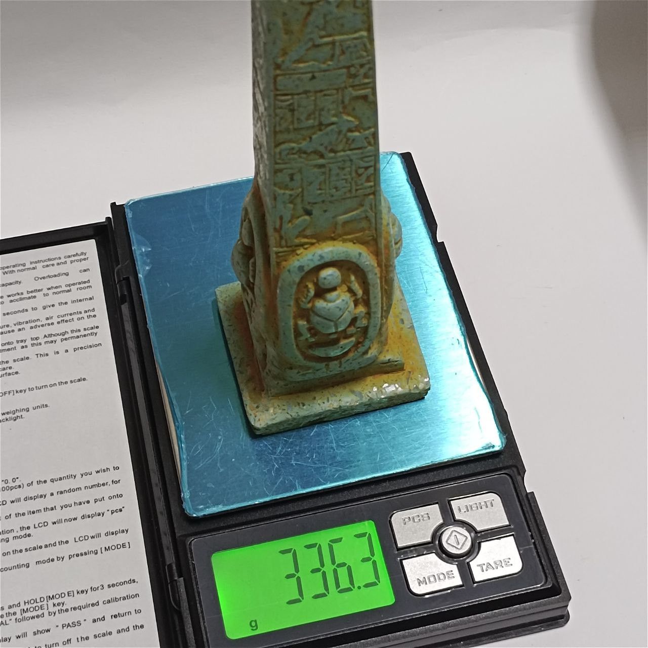 Replica Egypt obelisk with carved hieroglyphs made from rare