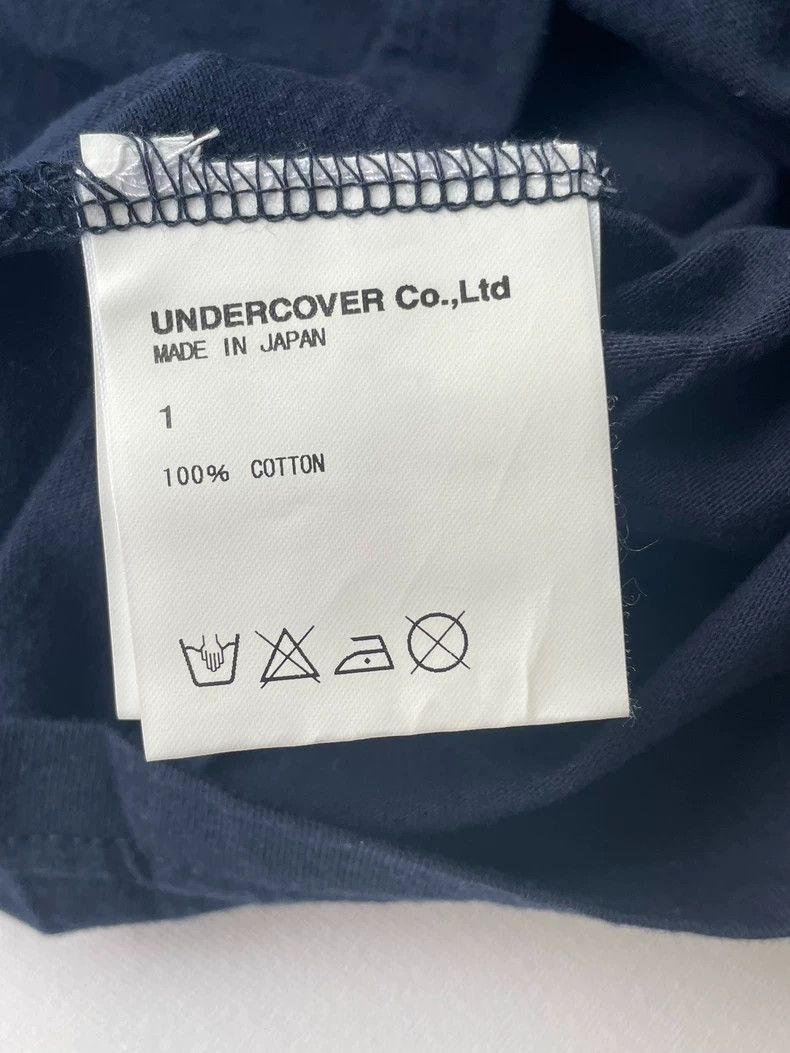 Undercover blade flower sleeveless shirt