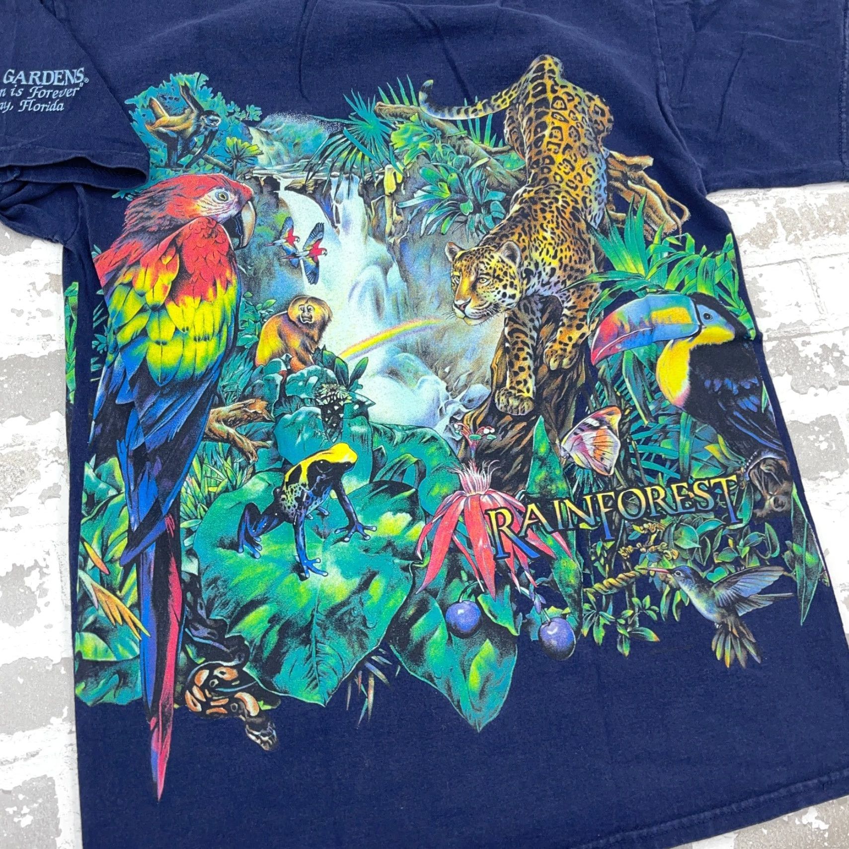 Habitat VINTAGE Habitat Busch Gardens Shirt Men M Blue Nature Rain Forest AOP All Over 80s Retro Graphic Print T-Shirt (Blue) Mens Size US M / EU 48-50 / 2 - 6 Thumbnail