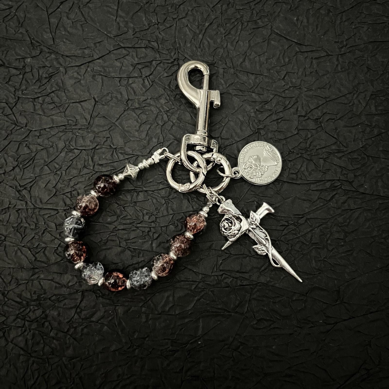 Jewelry Silver Beaded Keychain with Rose and Dagger Charms Size ONE SIZE - 1 Thumbnail