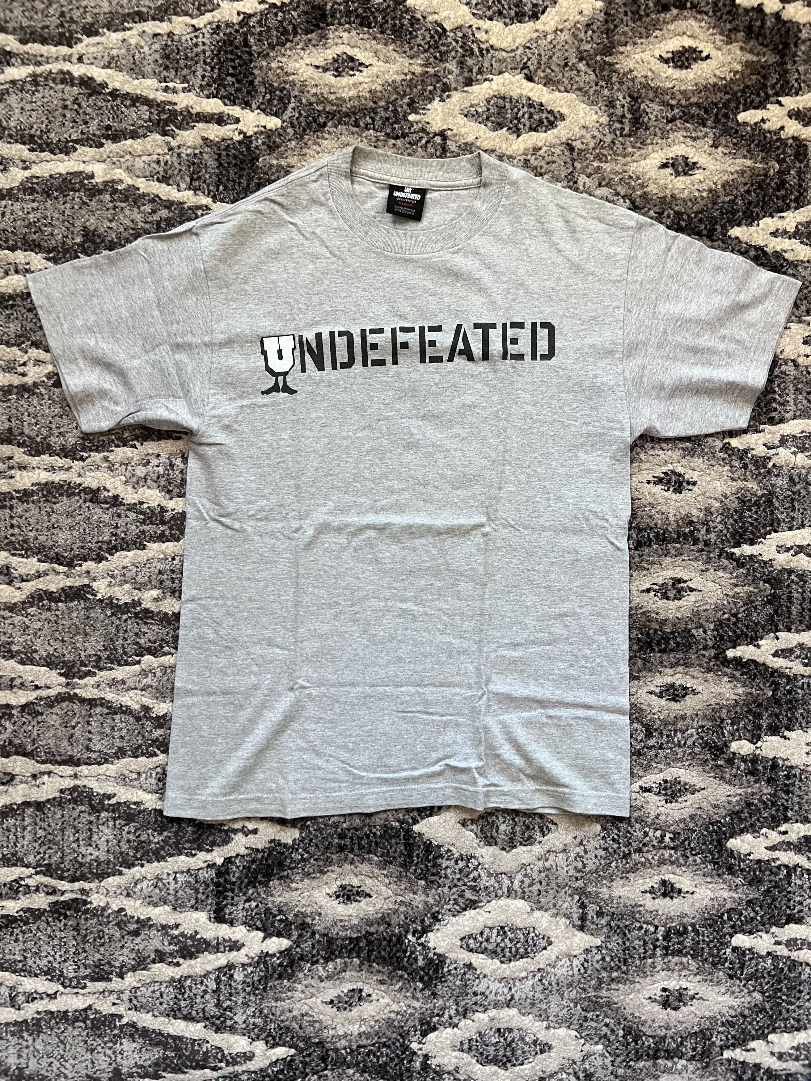 Rokit × Undefeated Undefeated x Rokit Money Tee | Grailed