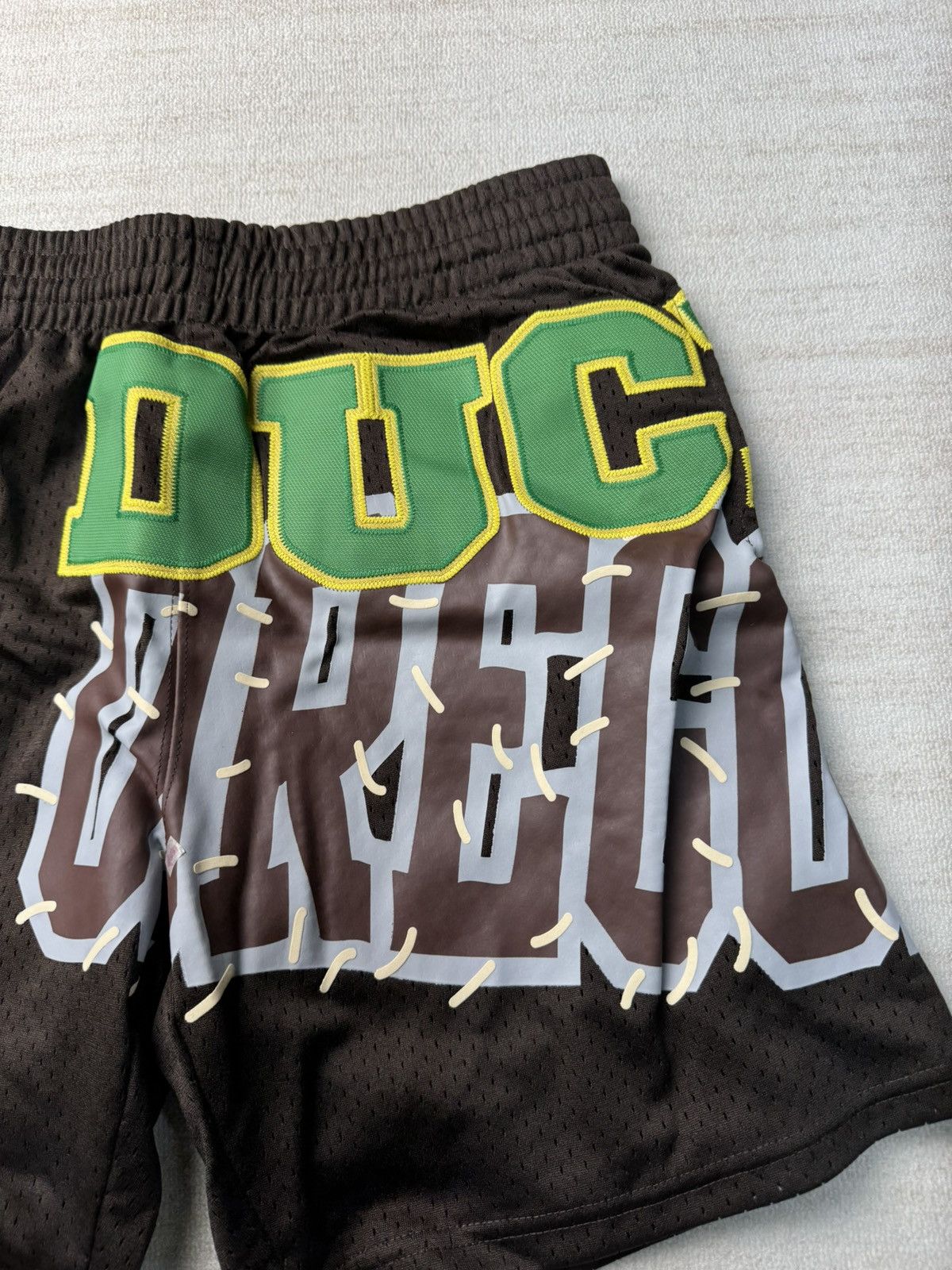 Mitchell & Ness × Travis Scott Oregon ducks basketball shorts Size US 30 / EU 46 - 1 Thumbnail