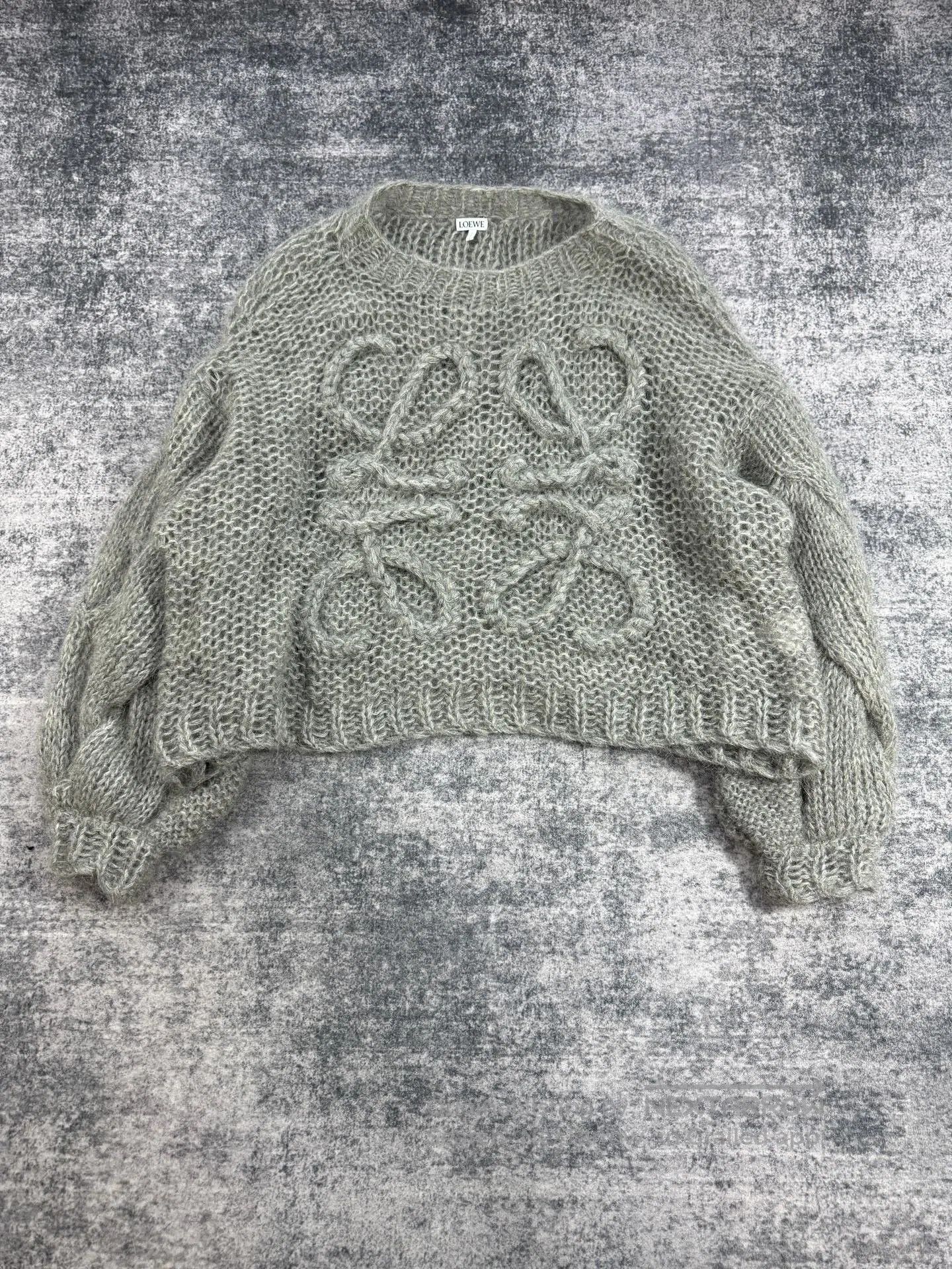 gray mohair cropped sweater by Loewe.
