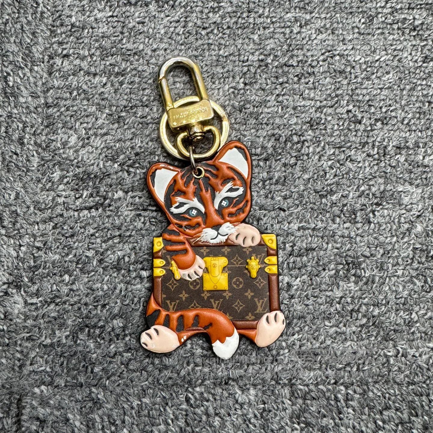 Louis Vuitton Louis Vuitton Tiger keychain| Size ONE SIZE - 1 Thumbnail