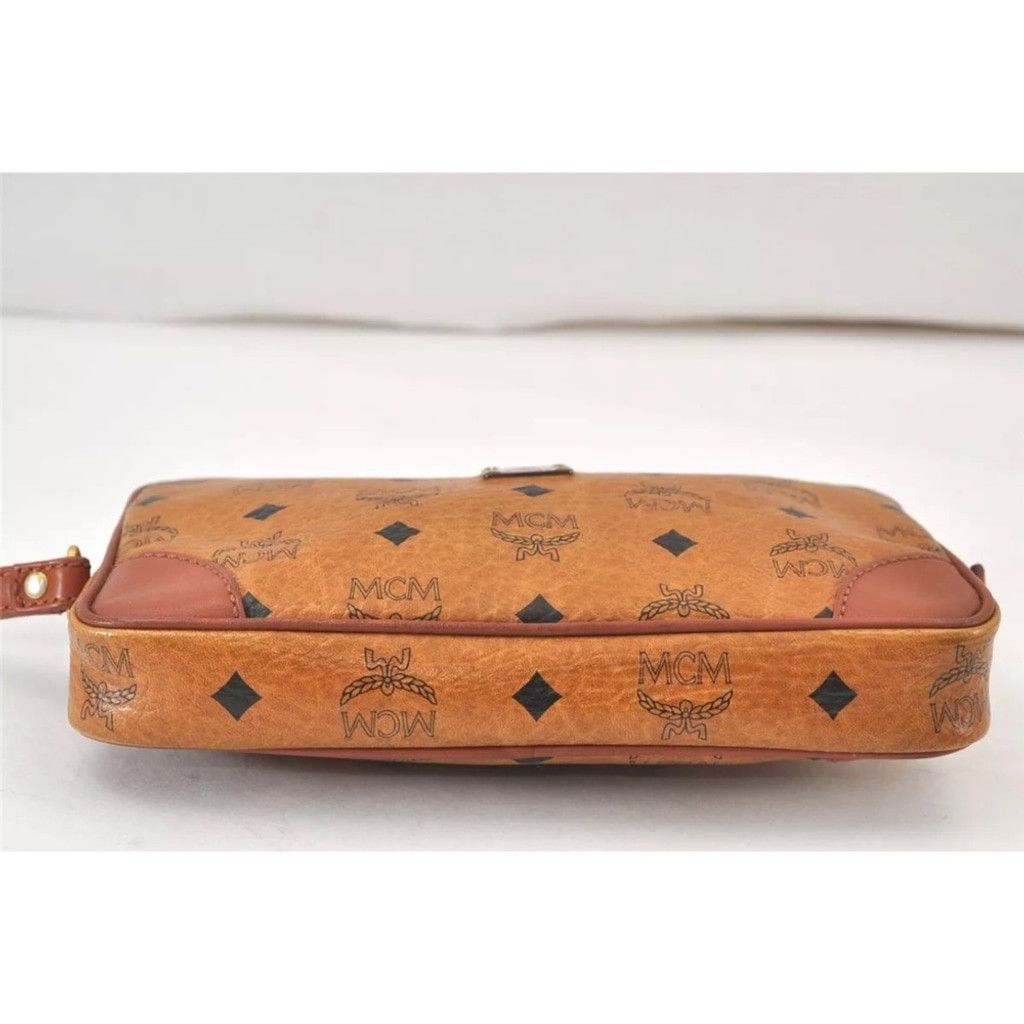 MCM MCM Brown Clutch with Logo Pattern and Wrist Strap Size ONE SIZE - 10 Thumbnail