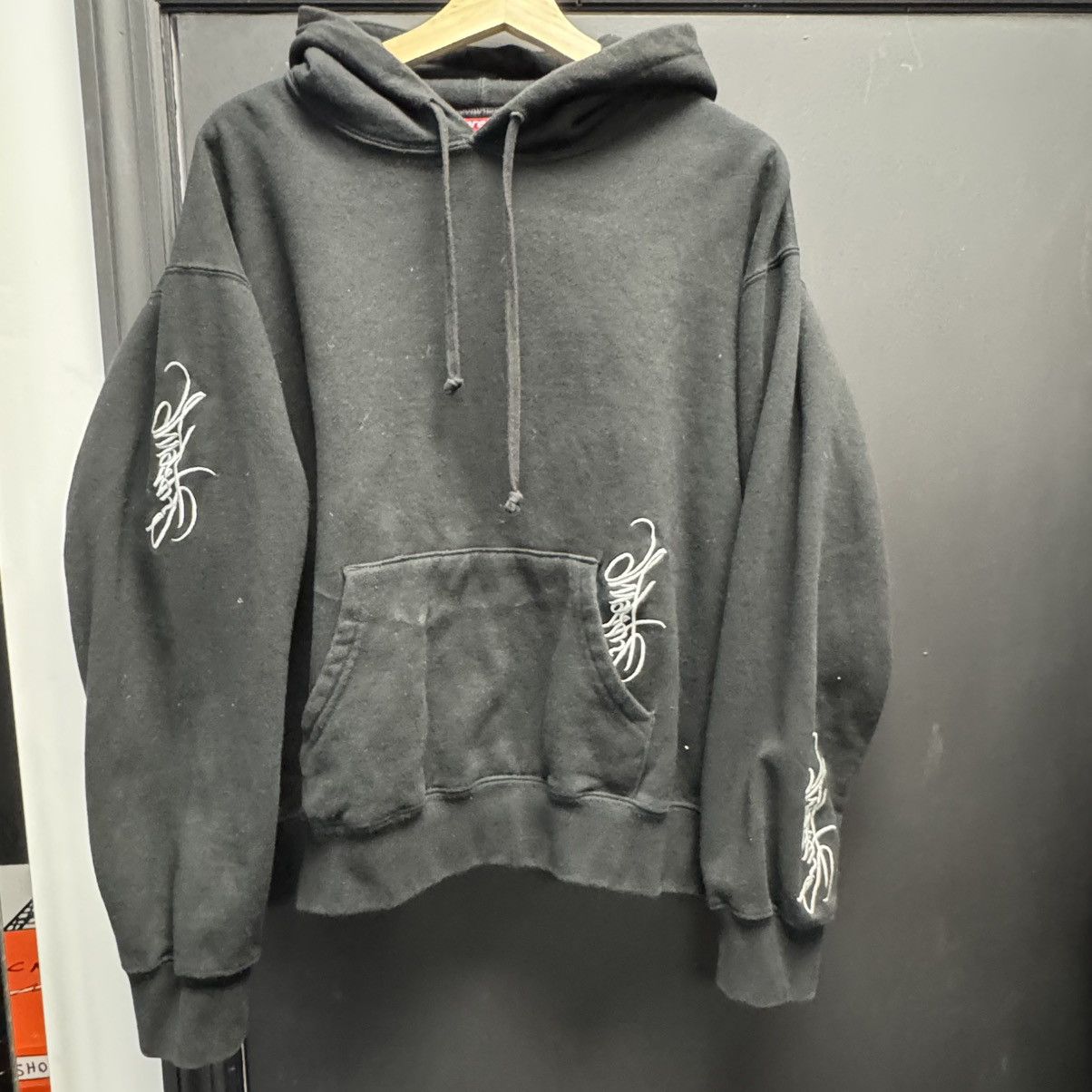 Supreme Supreme Tag Hooded Sweatshirt (SS24) Black | Grailed