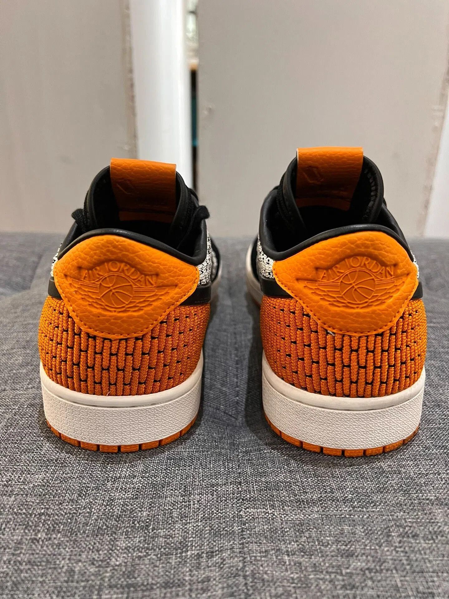 Jordan Brand aj1 low flyknit black orange sneakers. Size US 9.5 / EU 42-43 - 3 Thumbnail