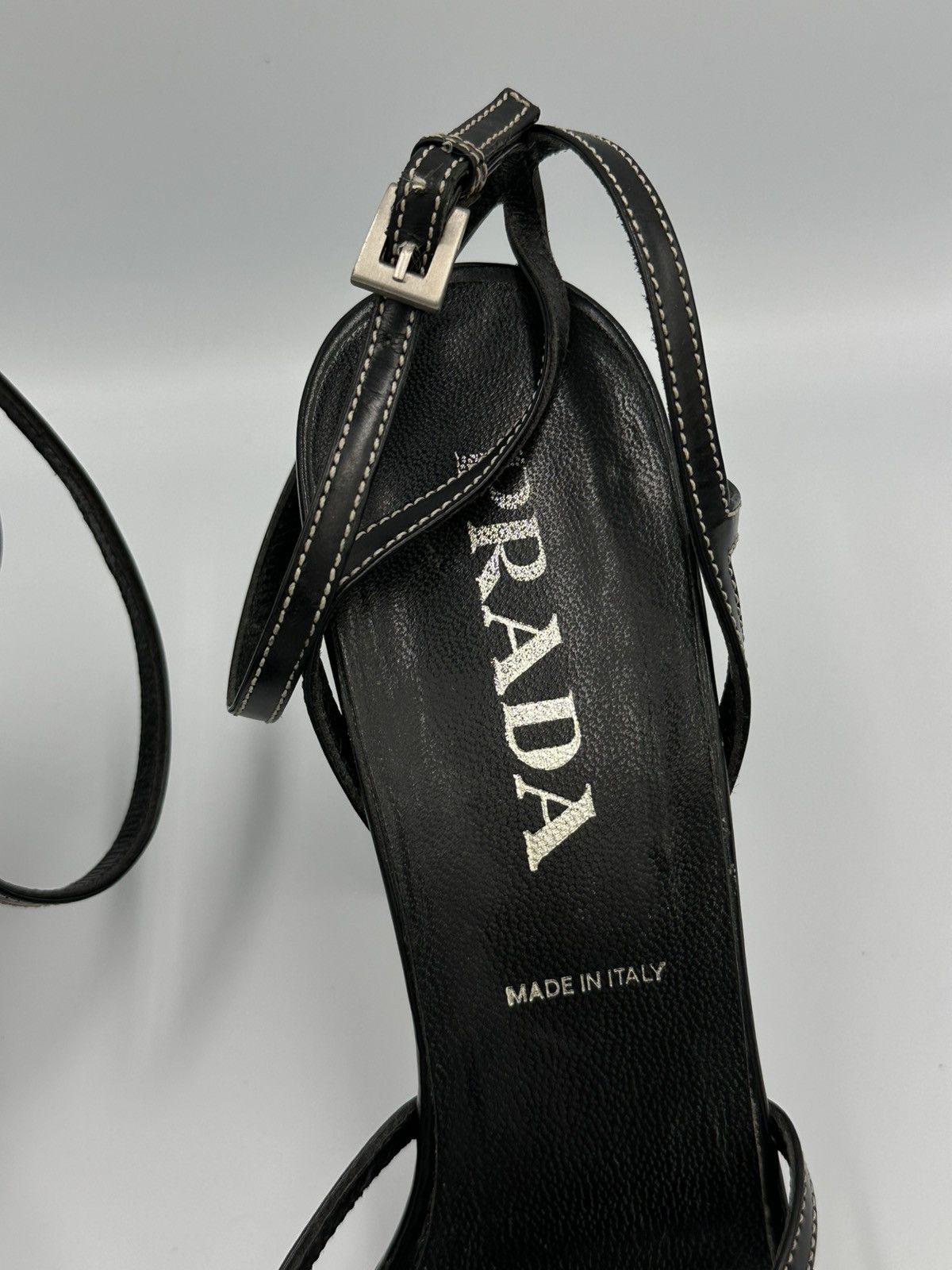 Prada heeled sandals crafted from black leather
