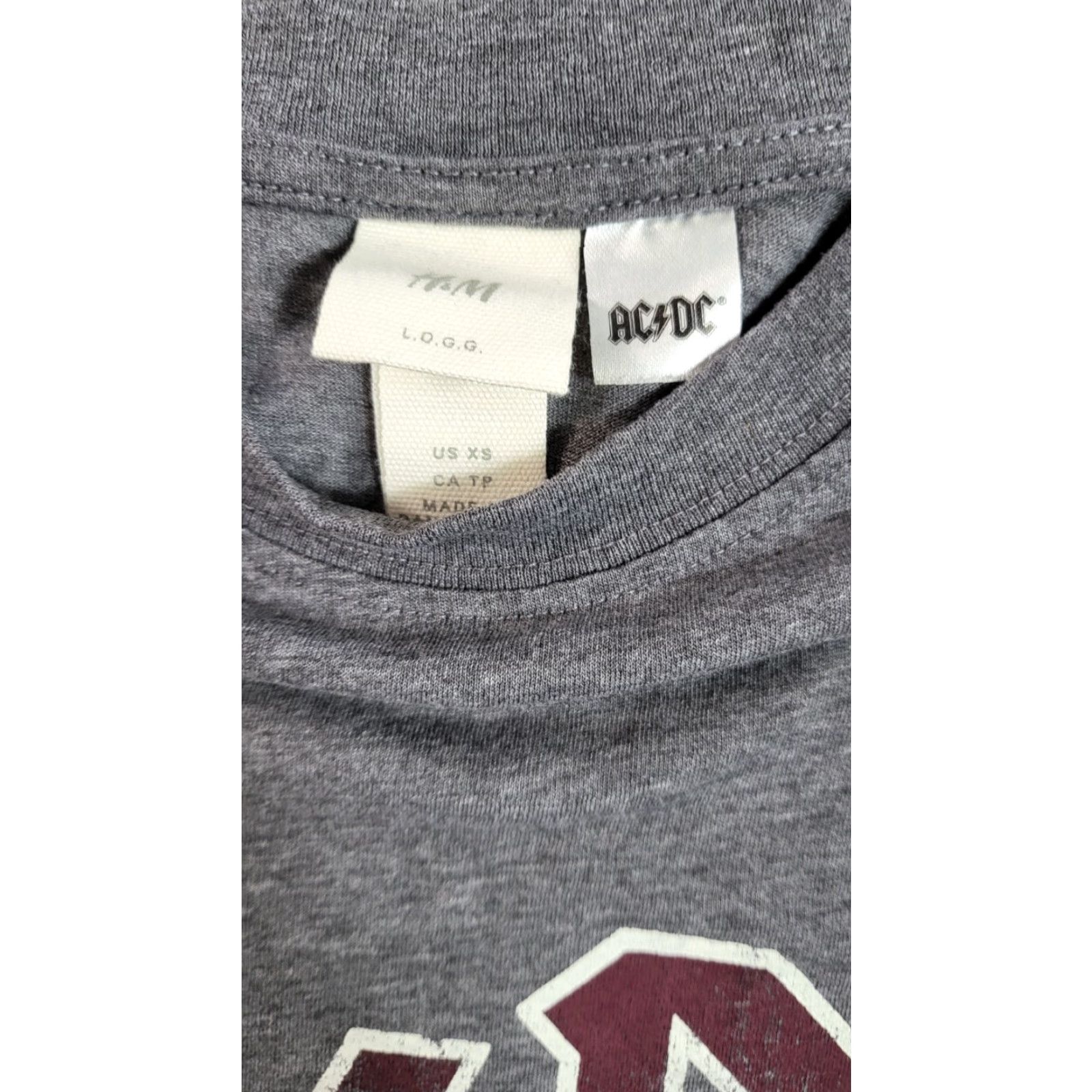 H&M **AC/DC Gray Men's Size XS Short Sleeve T-shirt EUC** User: AC/DC Gray Men's Size XS Short Sleeve T-shirt EUC Size US XS / EU 42 / 0 - 5 Thumbnail
