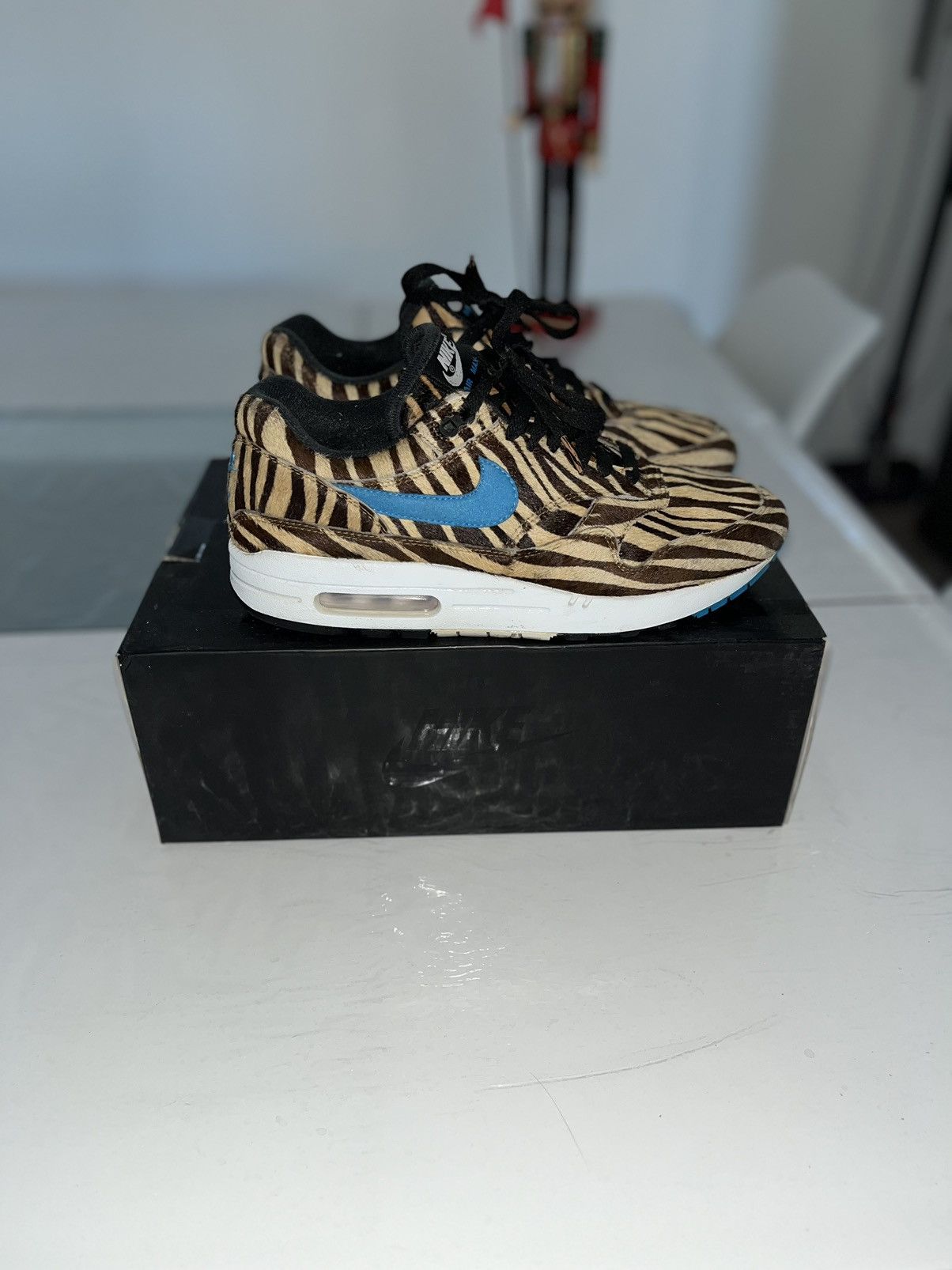 image of Air Max 1 Atmos Animal 3.0 Tiger Shoes in Black, Men's (Size 9)