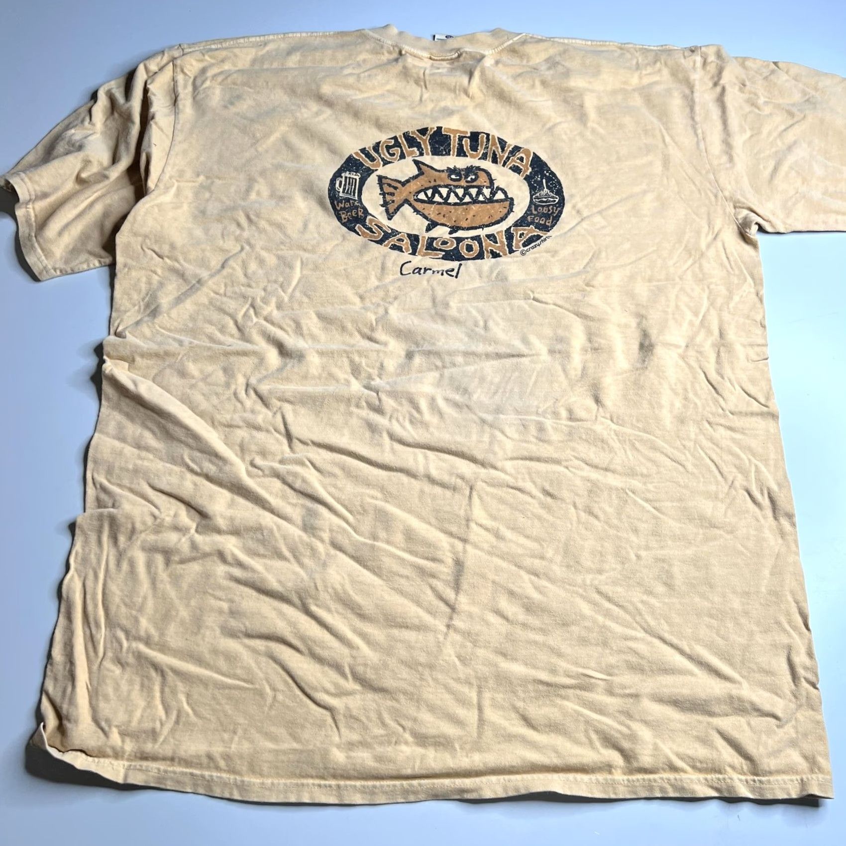 Vintage VINTAGE Crazy Shirts Mens 2XL Beige Ugly Tuna Saloona Carmel Beer Fish Graphic Tee Shirt Size US XXL / EU 58 / 5 - 6 Thumbnail