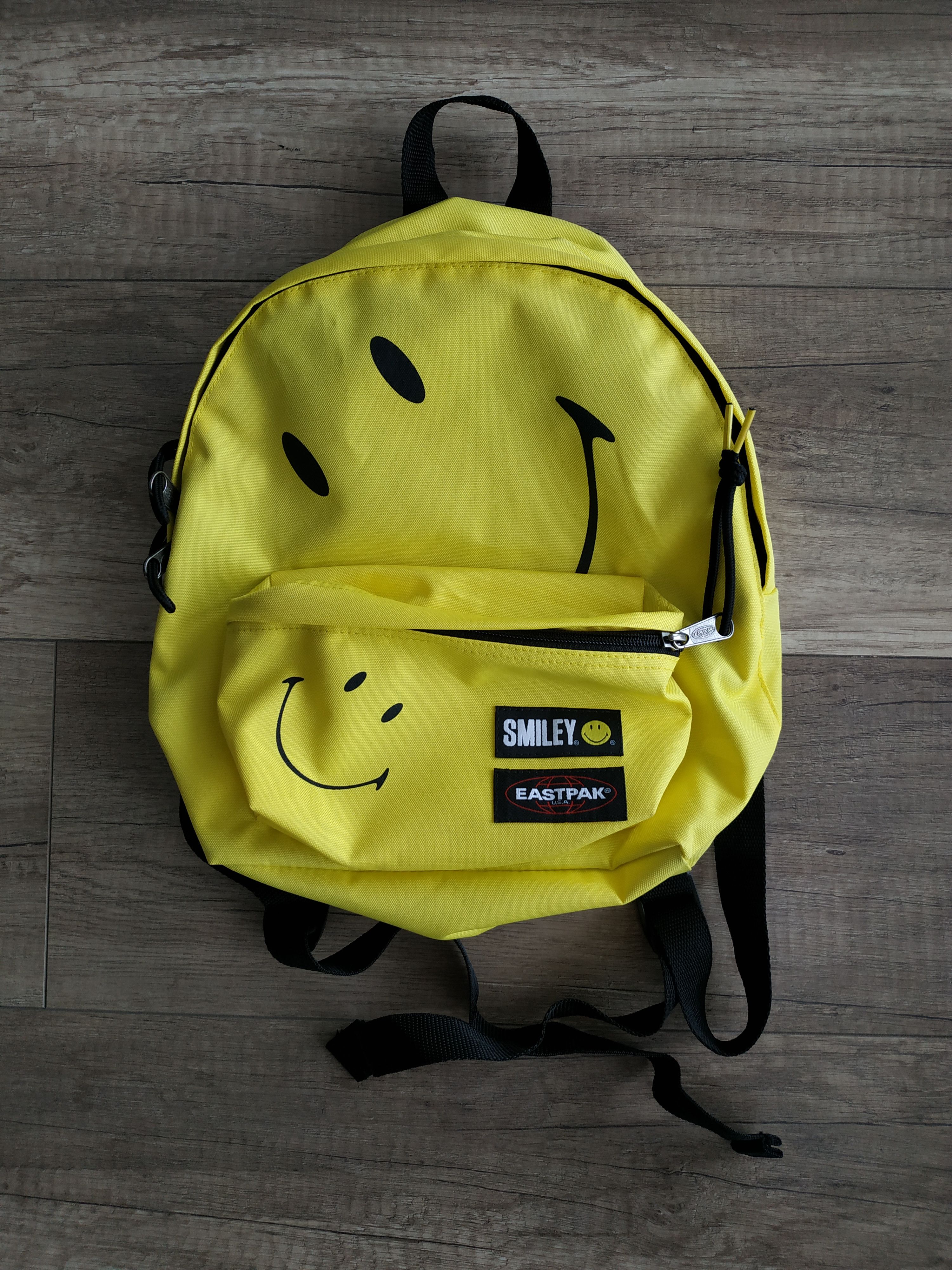 Eastpak Eastpak x Smiley Collabo Yellow Unisex Small Backpack Size ONE SIZE - 1 Thumbnail