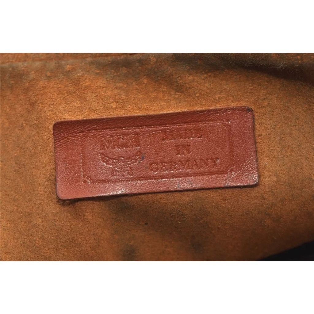 MCM MCM Brown Clutch with Logo Pattern and Wrist Strap Size ONE SIZE - 15 Thumbnail