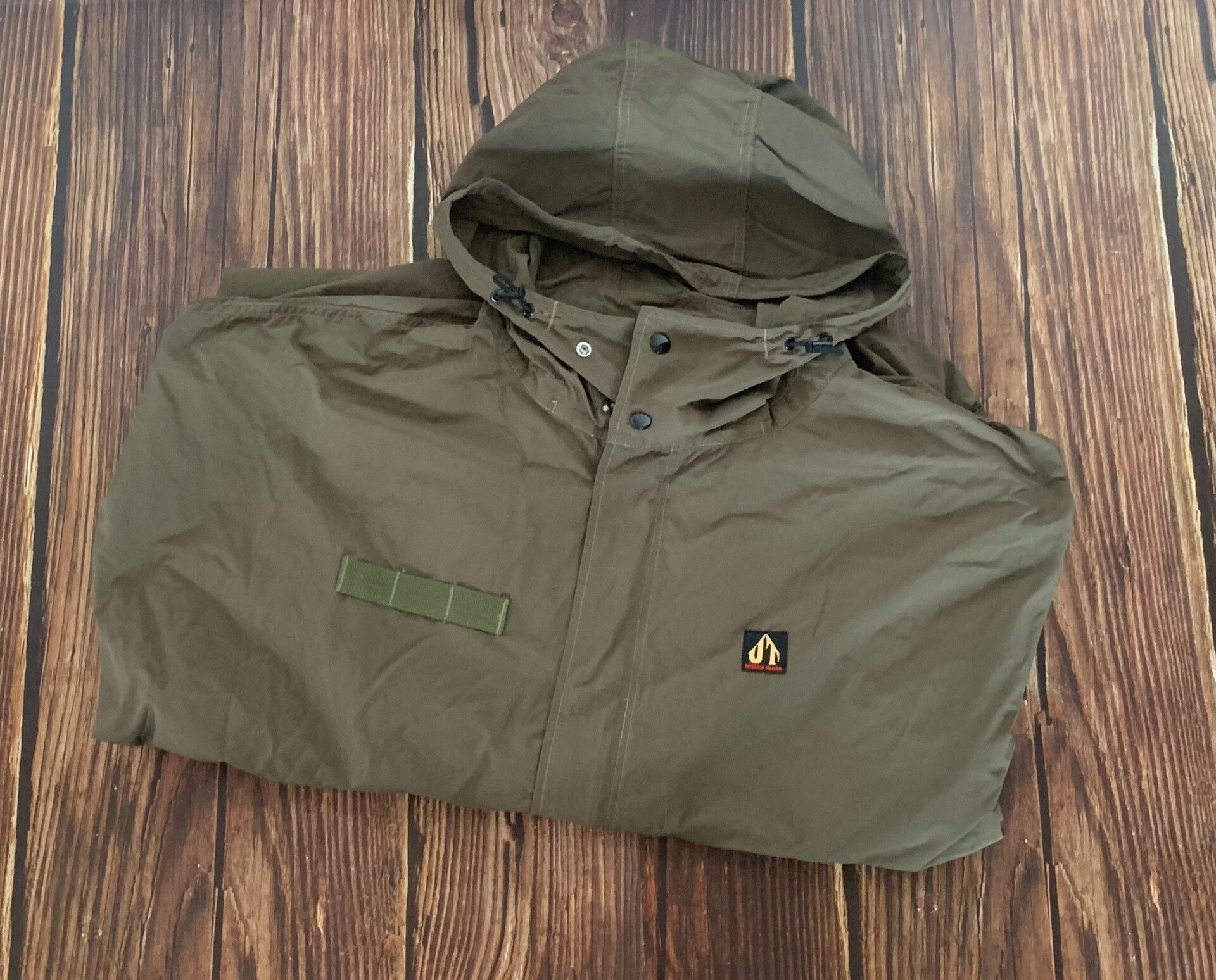 Freewheelers tactical raincoat for outdoor adventure in green Size US M / EU 48-50 / 2 - 1 Thumbnail