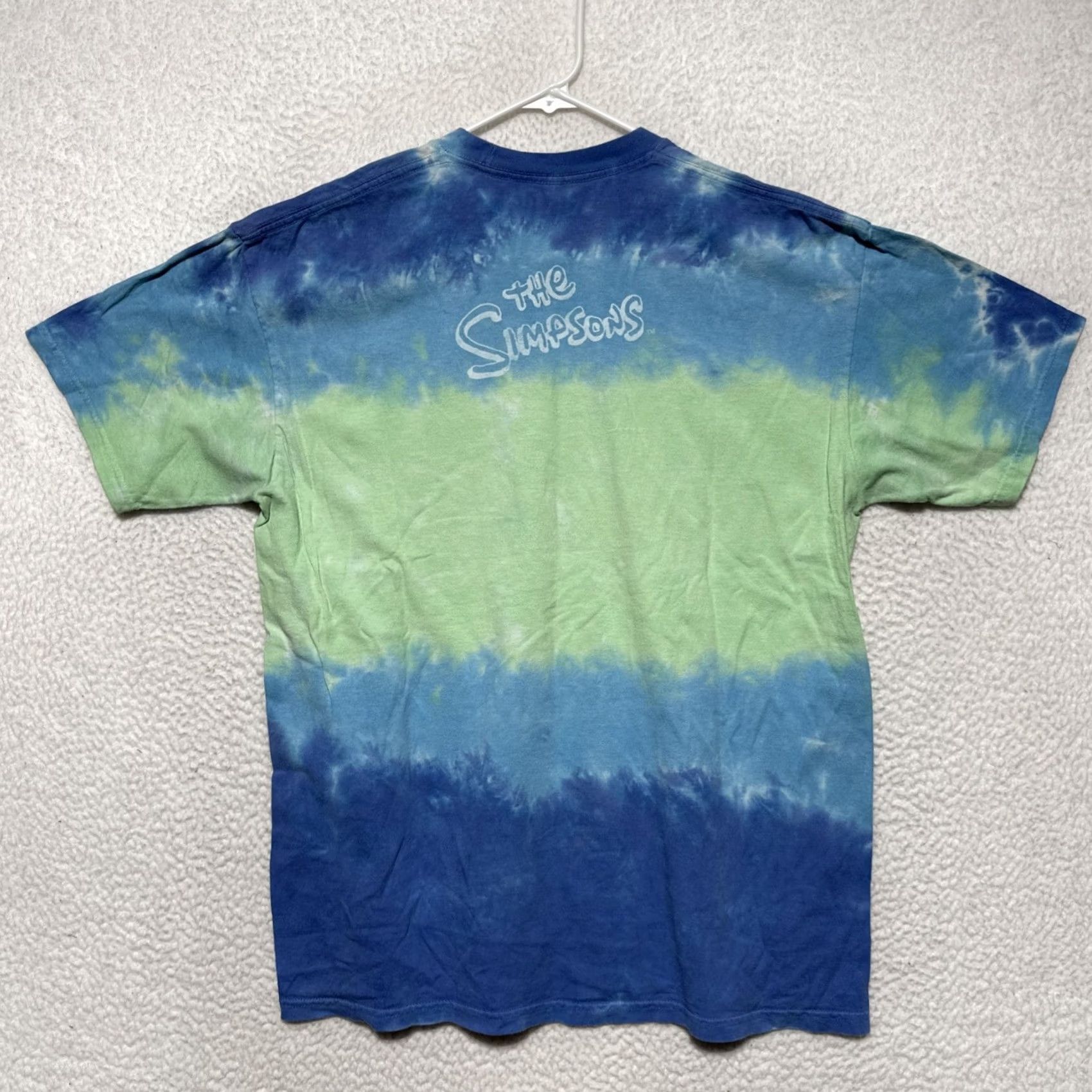Liquid Blue LIQUID BLUE The Simpsons Retro tie dye graphic crewneck tee Sz Large Crew Neck Short Sleeve Cotton Men T-Shirt 2010-2019 Vintage? Size US L / EU 52-54 / 3 - 4 Thumbnail
