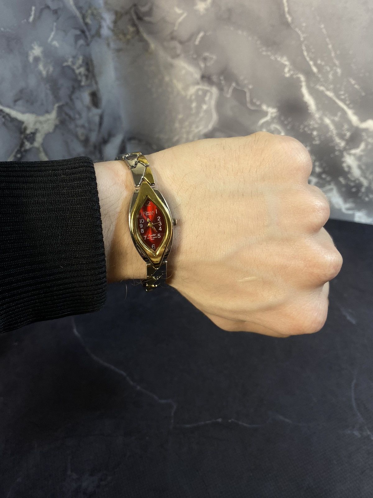 Jewelry Omax Red Dial Teardrop Watch Japanese Brand Size ONE SIZE - 1 Thumbnail