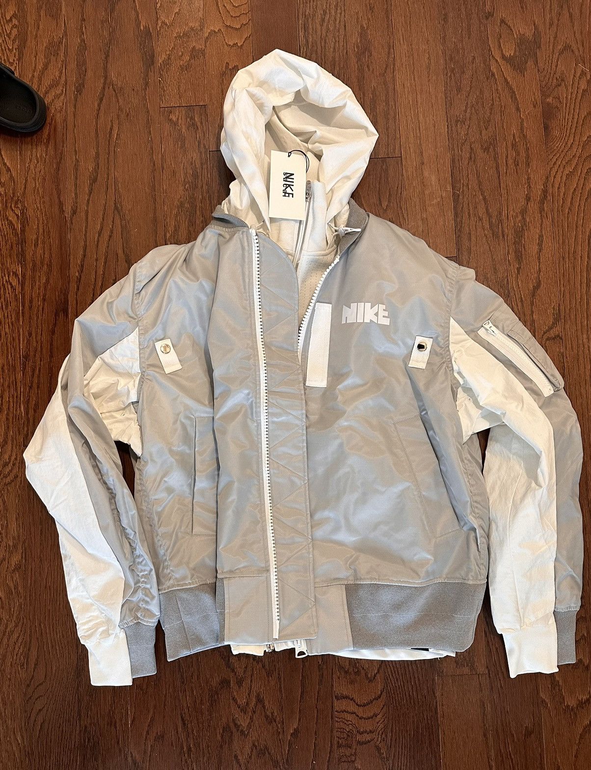 Sacai × NIKE Layered Bomber Jacket MA-1 Nike x Sacai Layered Bomber Jacket Grey Fog Men's - SS21 - US