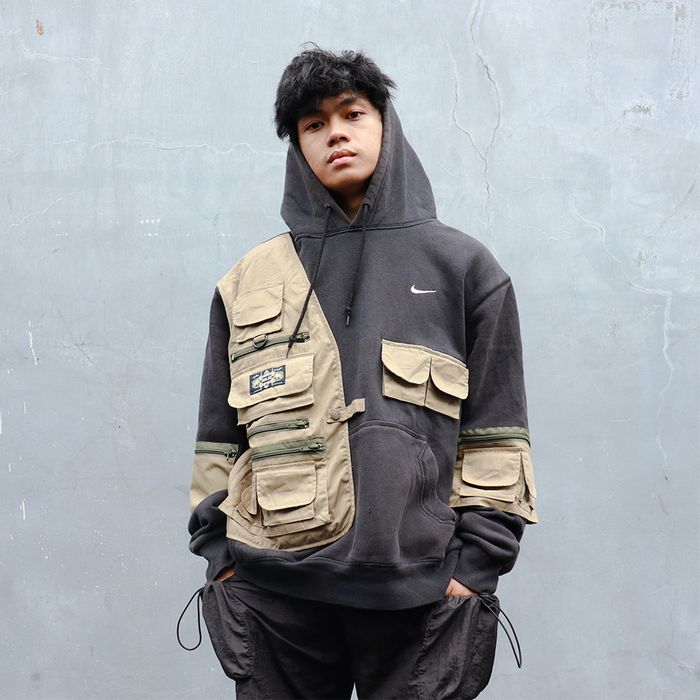 tan nike hoodie with black swoosh