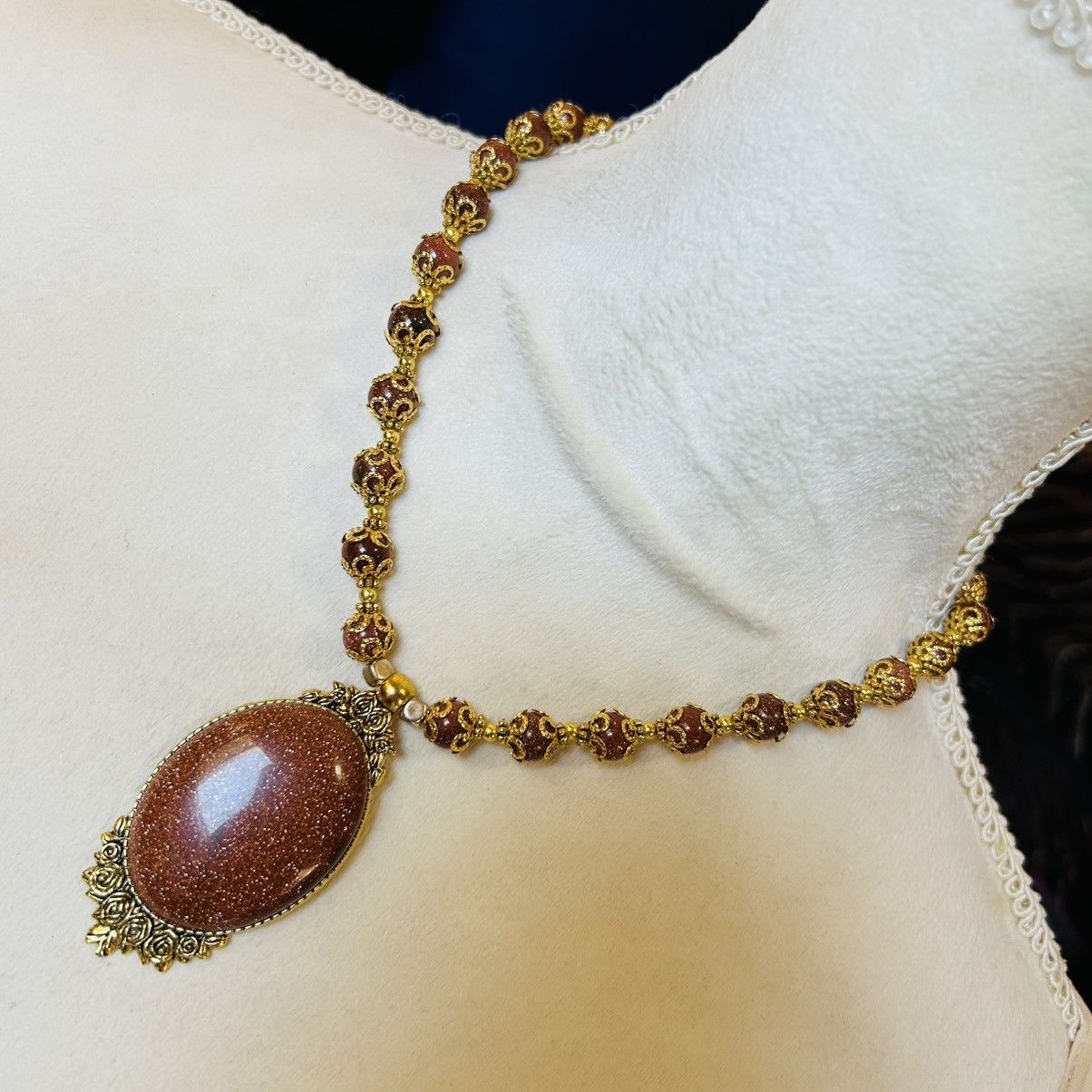 Handmade Handcrafted elegant goldstone cameo framed bead necklace Size ONE SIZE - 1 Thumbnail