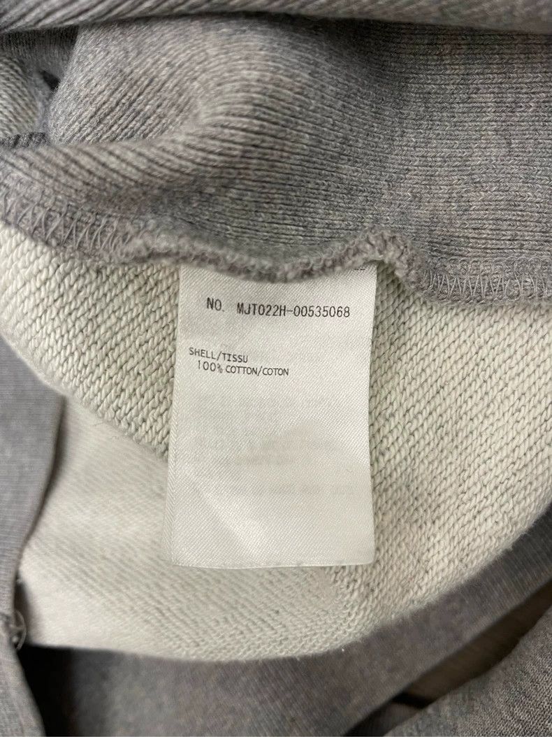 Thom Browne A trench coat with a hood